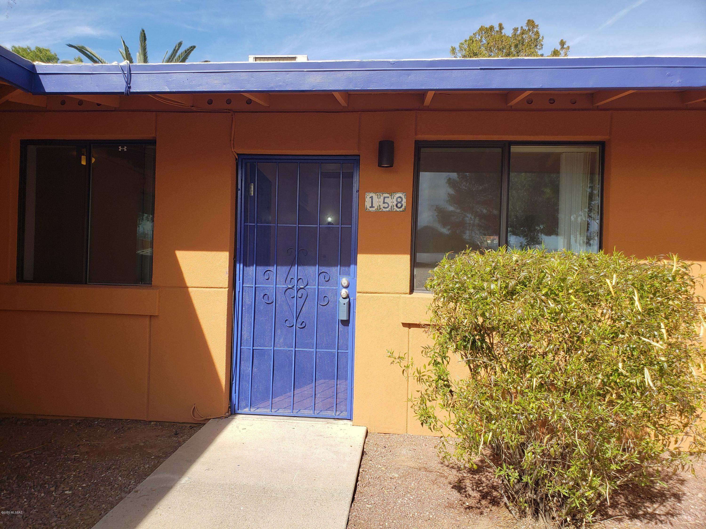 Fantastic opportunity to live and own affordably in this historic and up and coming area!  This 2 bedroom 2 Full Bath home is immaculate with tile throughout, appliances, large indoor laundry room and efficiency!  Mountain views, walk to downtown and surrounding happenings and low, low maintenance.  Someone else cleans your yard and your pool!  This could also be a great opportunity for a rental or vacation home, many limitless options here and the best part is the cost is a fraction of the surrounding values, surely to appreciate well with what is happening in the area.  Range price marketing, Seller will entertain offers between $115,000 and $125,000.