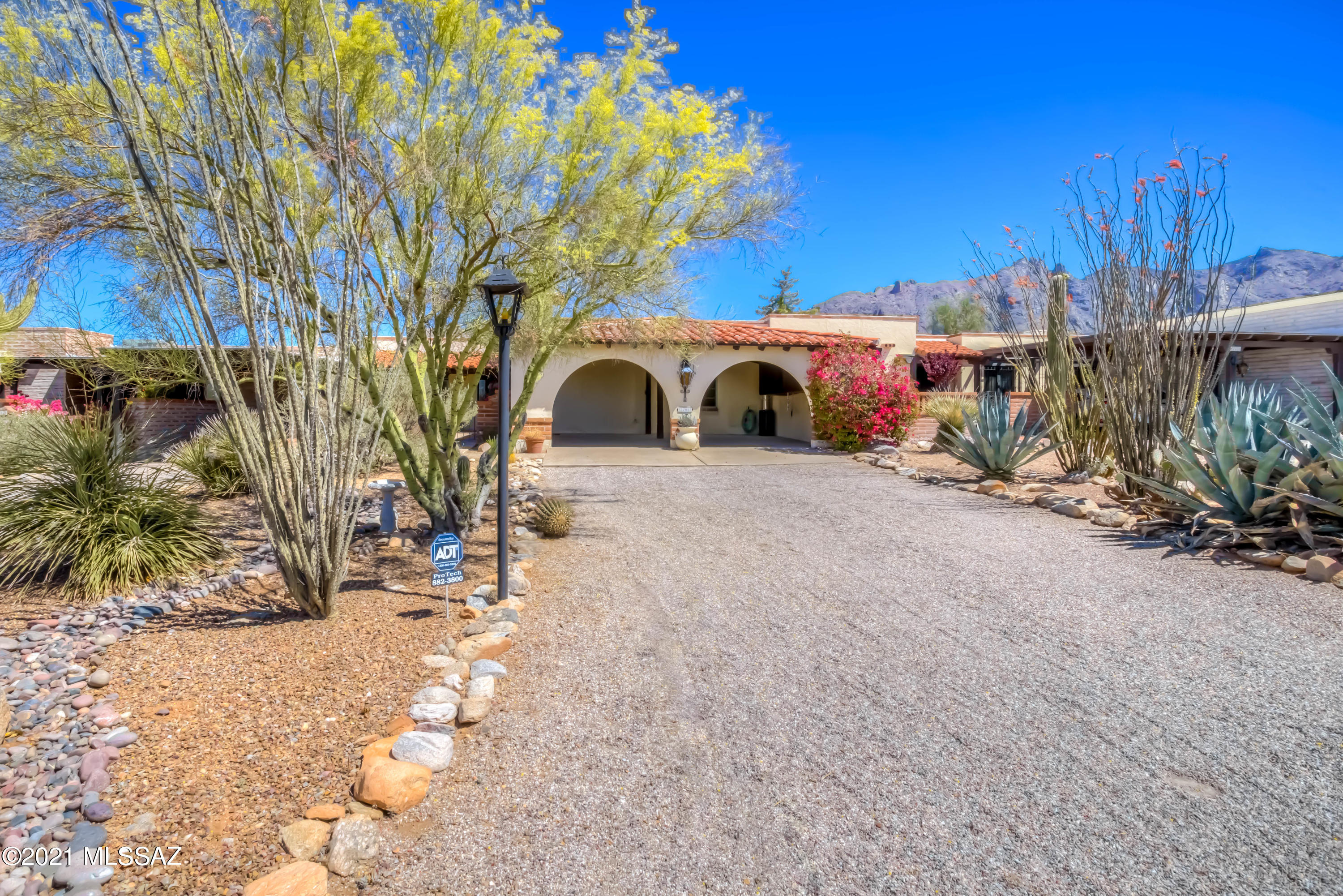 A RARE OPPORTUNITY to own a well cared-for, single level home in the beautiful Catalina Pueblo neighborhood.  This spacious townhome features 1,996 sq.ft., 3 bedrooms, 1.75 baths, a bright and open Living Room, Dining Area, Bonus Room/Office, saltillo tile, ceiling fans and a gorgeous kitchen with a Sub-Zero refrigerator, copper backsplash, R/O filter at the sink, breakfast bar and nook!  The large Primary Bedroom features French doors, dual closets and a luxurious en suite bathroom.   Venture out back to your private, north-facing covered patio with mountain views, built-in BBQ, extended brick pavers, all backing to natural, open space!  This location is unbeatable, close to shopping, dining, schools, medical and hiking/biking trails! Be sure to take our 3D walk through tour!