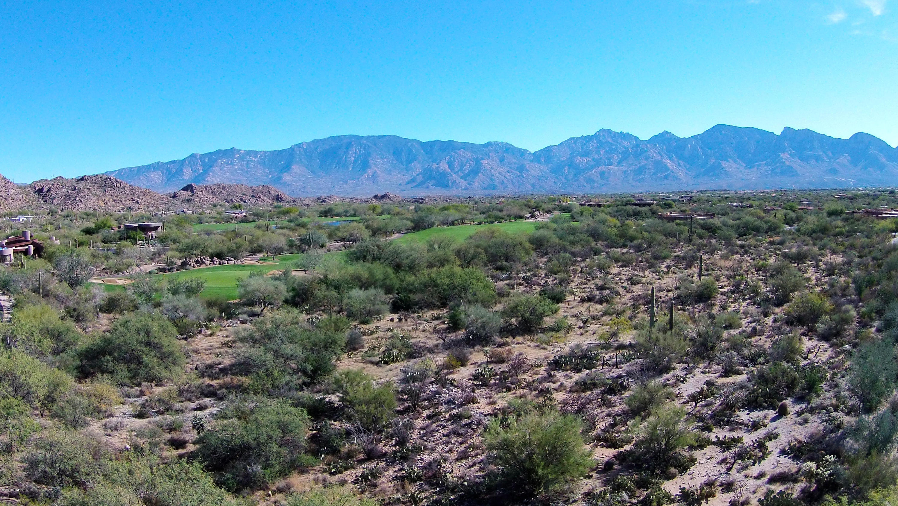 BEAUTIFUL GOLF COURSE LOT IN THE EXCLUSIVE GUARD-GATED COMMUNITY STONE CANYON. SPECTACULAR VIEWS OF ALL THE SURROUNDING MOUNTAIN RANGES ESPECIALLY THE TORTOLITA AND CATALINA MOUNTAINS. THIS BUILD SITE IS VERY FLAT AND WILL HAVE VERY LOW COST OF DEVELOPMENT. 1 ACRE CORNER LOT LOOKING DIRECTLY AT THE 11TH GREEN OF THE STONE CANYON GOLF COURSE. THE LOT IS LOCATED CLOSE TO THE CLUB HOUSE AND FITNESS FACILITY. INCLUDES THE SMALL PARCEL OVERLAPPING. THE STONE CANYON CLUB, OWNED BY PHIL MICKELSON IS A PRIVATE GUARD-GATED LUXURY RESIDENTIAL GOLF COMMUNITY RANKED #34 IN GOLFWEEKS TOP 100 RESIDENTIAL GOLF COURSES IN 2016. THIS CUSTOM SITES OFFERS PRIVACY, OUTSTANDING VIEWS & ENDLESS ARCHITECTURAL DESIGN OPTIONS. BUILD WHEN YOU ARE READY AND ENJOY THE PHENOMENAL LIFESTYLE NOW.
