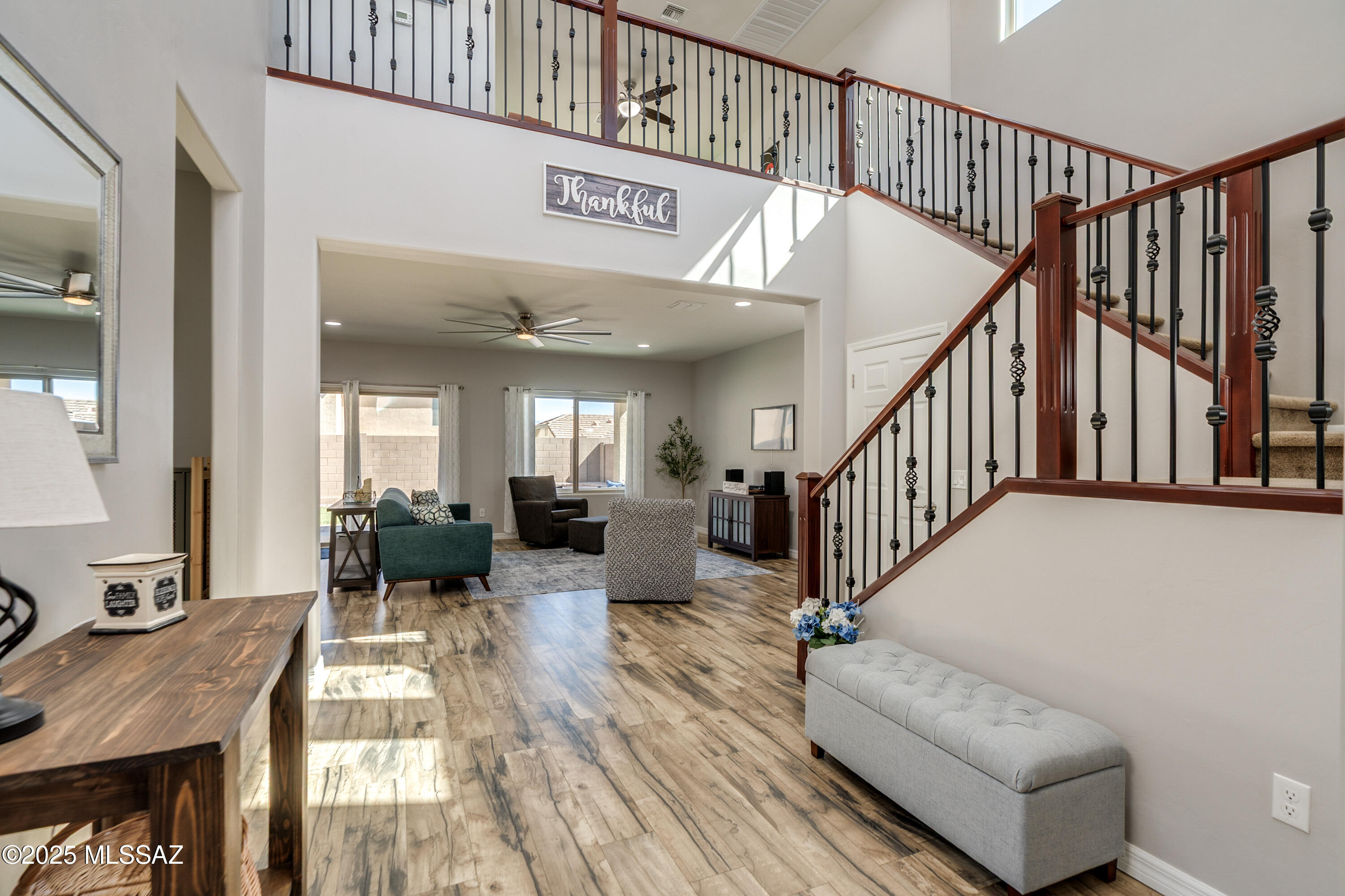 WELCOME TO THIS GORGEOUS 4BR(INCLUDING ONE DOWNSTAIRS)/3BA & HUGE LOFT- ABSOLUTELY STUNNING HOME - IN SOUGHT-AFTER SIERRA MORADO COMMUNITY IN VAIL SCHOOL DISTRICT!THIS SPACIOUS 2493 SQ/FT WELL-DESIGNED FLOORPLAN SHOWCASES 4 BR/3BA & A BIG LOFT UPSTAIRS. THE BEAUTIFUL GOURMET KITCHEN IS A CHEF'S DELIGHT FEATURING STYLISH TILE BACKSPLASH,GAS RANGE, A CENTER ISLAND FOR MEAL PREP & A SPACIOUS WALK-IN PANTRY.THE BIG DINING AREA & GREAT RM -BOTH ACCESS THE EXTENDED COVERED PATIO FOR FAMILY & FRIENDS TO ENJOY THE FULLY LANDSCAPED BACKYARD. THE PRIMARY SUITE IS A LUXURIOUS RETREAT W/ BIG WALK-IN CLOSET & A GREAT BA W/ SEPARATE SHOWER AND TUB & VANITIES. THE FINISHED 2-CAR GARAGE HAS AMPLE STORAGE! ENJOY GREAT COMMUNITY POOL,TRAILS& PARKS! VERY CLOSE TO RESTAURANTS,SHOPPING,HOSPITALS,DMAFB & I-10!