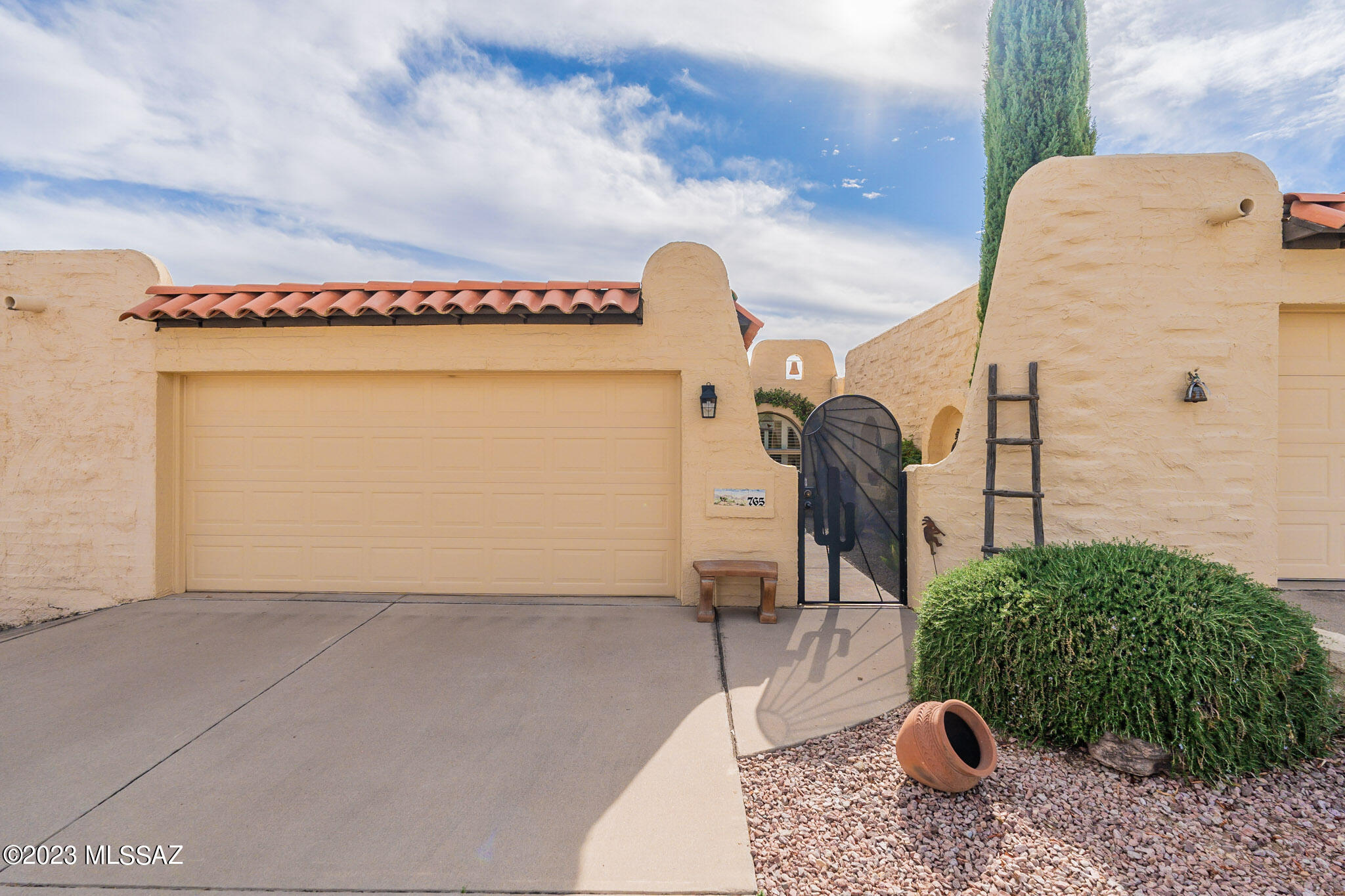 Beautiful Mountain Views, roof recoat 2022, newer stainless steel appliances, newer ceiling fans, new toilets 11-23,heat pump 2020, screen enclosed garage, replaced gate & storm door, window coverings. No GVR but available. Popular floor plan in Esperanza. Well taken care of home. Enjoy the beauty and tranquility of your new home. Entertainment cabinet & small hutch in living room, master bedroom, kitchen table and chairs, patio furniture,  stays. Yard art in backyard does not convey.