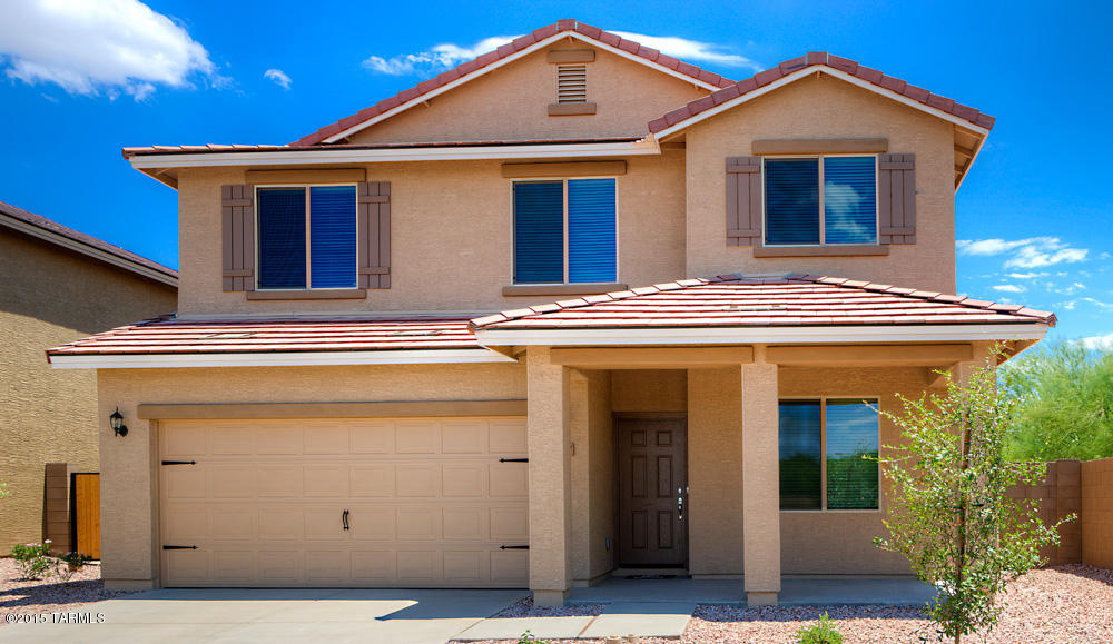This new 2 story, 5 bedroom, 3 bath home is located within the picturesque community of Sonoran Ranch. The Cimarron floor plan offers over $10,000 in upgrades including energy efficient appliances, granite countertops, custom wood cabinets, brushed nickel hardware and a two car garage. This open floor plan offers a large kitchen island, spacious family room and separate living room, as well as a bedroom and full bath downstairs. Upstairs showcases a master suite with a walk-in closet, double sinks in both full baths and a large laundry room. This new home is complete with a fully fenced backyard, covered patio and front yard landscaping. Dispersed throughout the Sonoran Ranch community you will find miles of walking trails, as well as a park with a playground and a spacious picnic area.