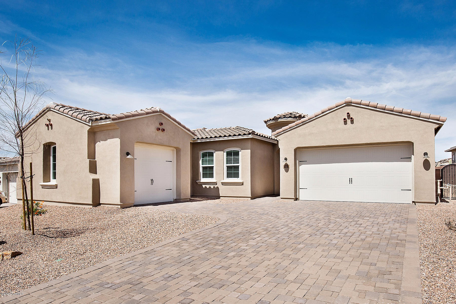 BEAUTIFUL Spanish-style Cimarron plan is MOVE-IN READY! This 4BR+den home features Gourmet kitchen w staggered cherry cabinets, LED underlites, granite counters, tiled backsplash, 5-burner cooktop & oven/micro combo. For added convenience; Butler’s pantry w/wet bar & walk-pantry. Great room includes cozy fireplace & 15' sliding glass door to back patio. Master suite  boasts large walk-in closet, slider to back patio, granite vanity w dual sinks & walk-in shower w/spa niche. Other upgrades include: 20x20 tile, recessed kitchen lighting, two-tone paint, 4-car garage space, gas BBQ stub-out & recirculating hot water pump & more!