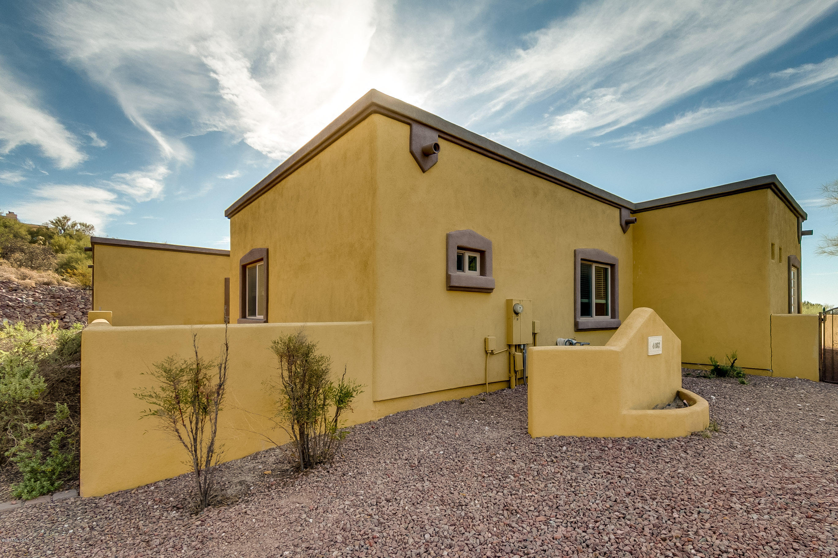 Wonderful contemporary single story newer home built on almost 3/4 of an acre. Nicely appoint tiled floors, wonderful white cabinetry with granite counter tops, open floor plan with tall ceilings throughout, cozy fireplace, new carpet, new roof coating, sparking pool and raise spa and a 3 car garage.  Excellent opportunity to live in Vista Ciudad Estate.