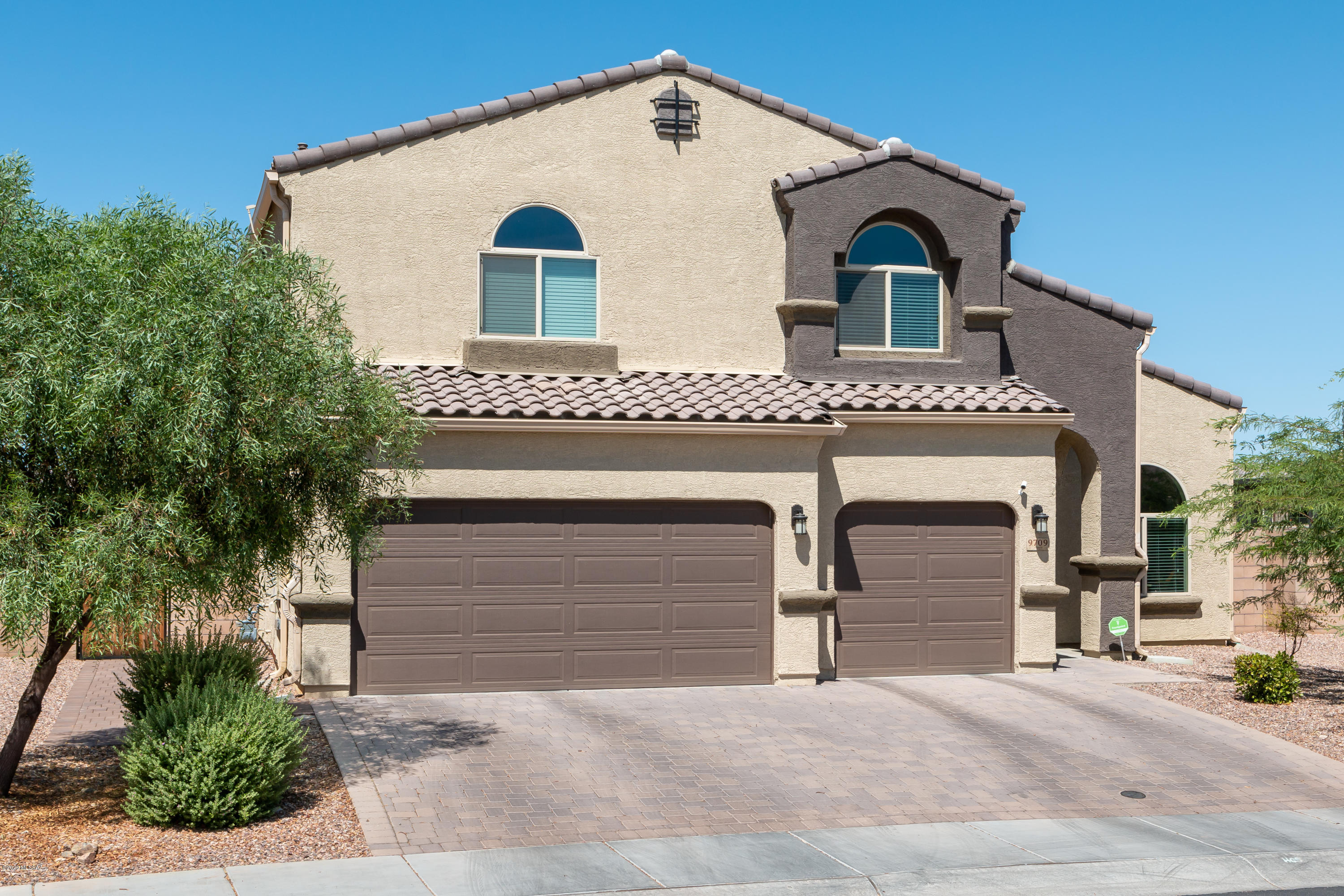 Gorgeous Saguaro Bloom home on a premium lot with great Mountain and Sunset views. Ventana Model features 4 BR/3BA, Loft, upgraded Chefs Kitchen with SS appliances, gas cooktop, double ovens, huge Breakfast Bar Island & Walk In Pantry. Spacious Family Room off Kitchen. Large Bedroom/Bath on 1st floor makes a great Guest Suite. Enjoy the large Primary Suite with oversized Walk In Closet, Bath with dual vanity, Garden Tub and Sep Shower. Secondary Bedrooms are spacious and the Loft makes a great Playroom or Home Office. The home has upgraded flooring, many upgrades, premium lot backing to common area, no rear neighbors and is right across from a Park. Low Utility Bills with Owned Solar System, Electric Charging Station, upgraded smart features-switches, camers & doorbell. See Today!
