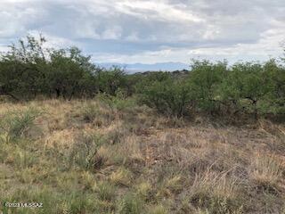 Nice building lot, area is fairly flat but up high with nice views all around.  All paved road.  Electric is at the street.  There is a house next door and other homes farther down the street.  I have sent a water verification to the water co.