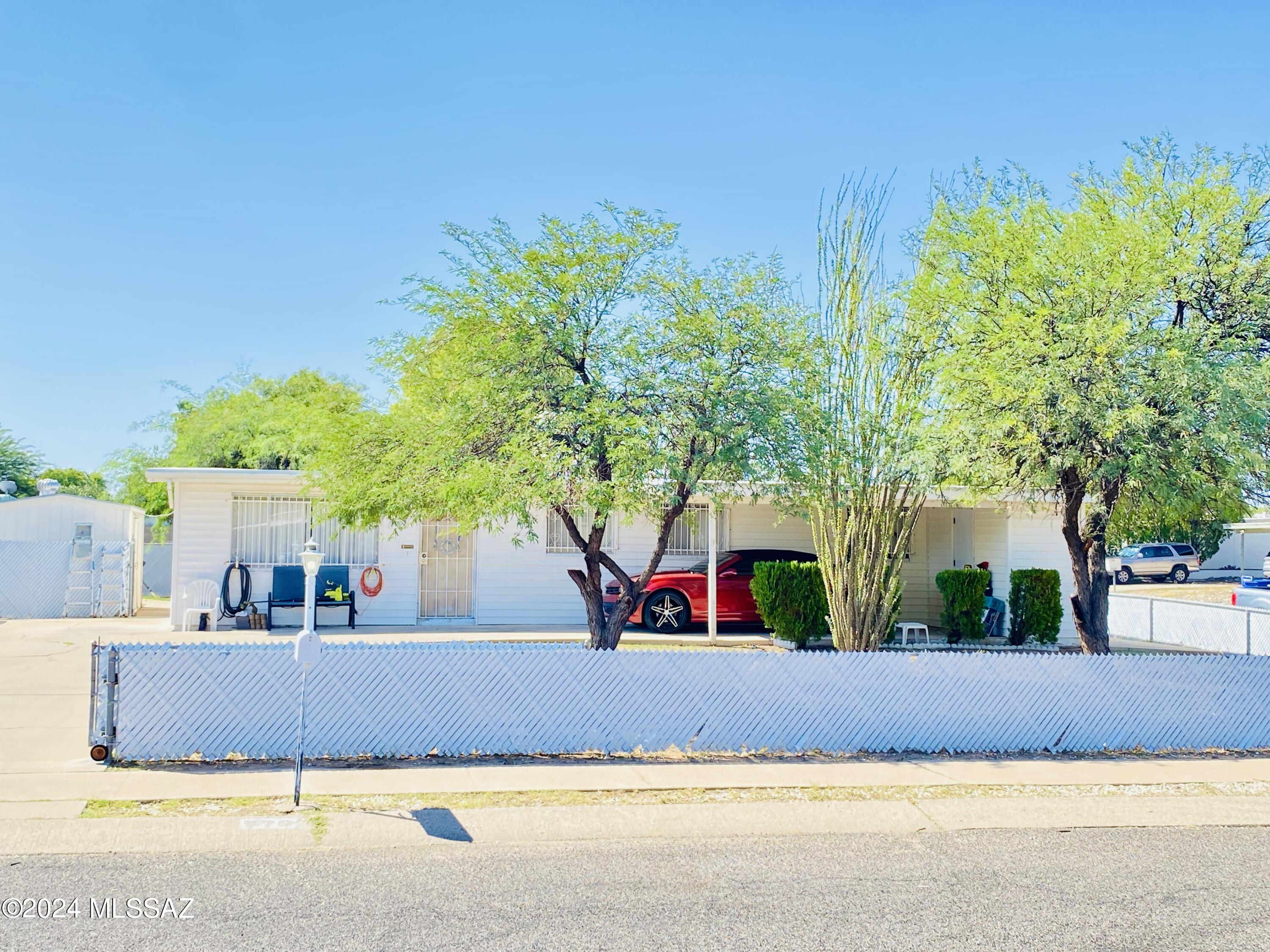 *****Seller is entertaining offers between $237,999-$250,000***** 

Welcome to this delightful 4-bedroom, 2-bath home on Tucson's desirable East side! Nestled on a generous corner lot, it features a carport to keep your car cool during those hot summer days and offers plenty of space for RV parking. Inside, you'll find fresh new paint, ample storage, and an inviting enclosed Arizona room. Step outside to a spacious backyard, ideal for relaxing or entertaining. Conveniently located near Pima Community College, Fred Enke Golf Course, gym, shopping, schools, and the picturesque Lakeside Lake. Just 15  minutes from the airport and Davis-Monthan AFB. This warm and inviting home is waiting for you!
