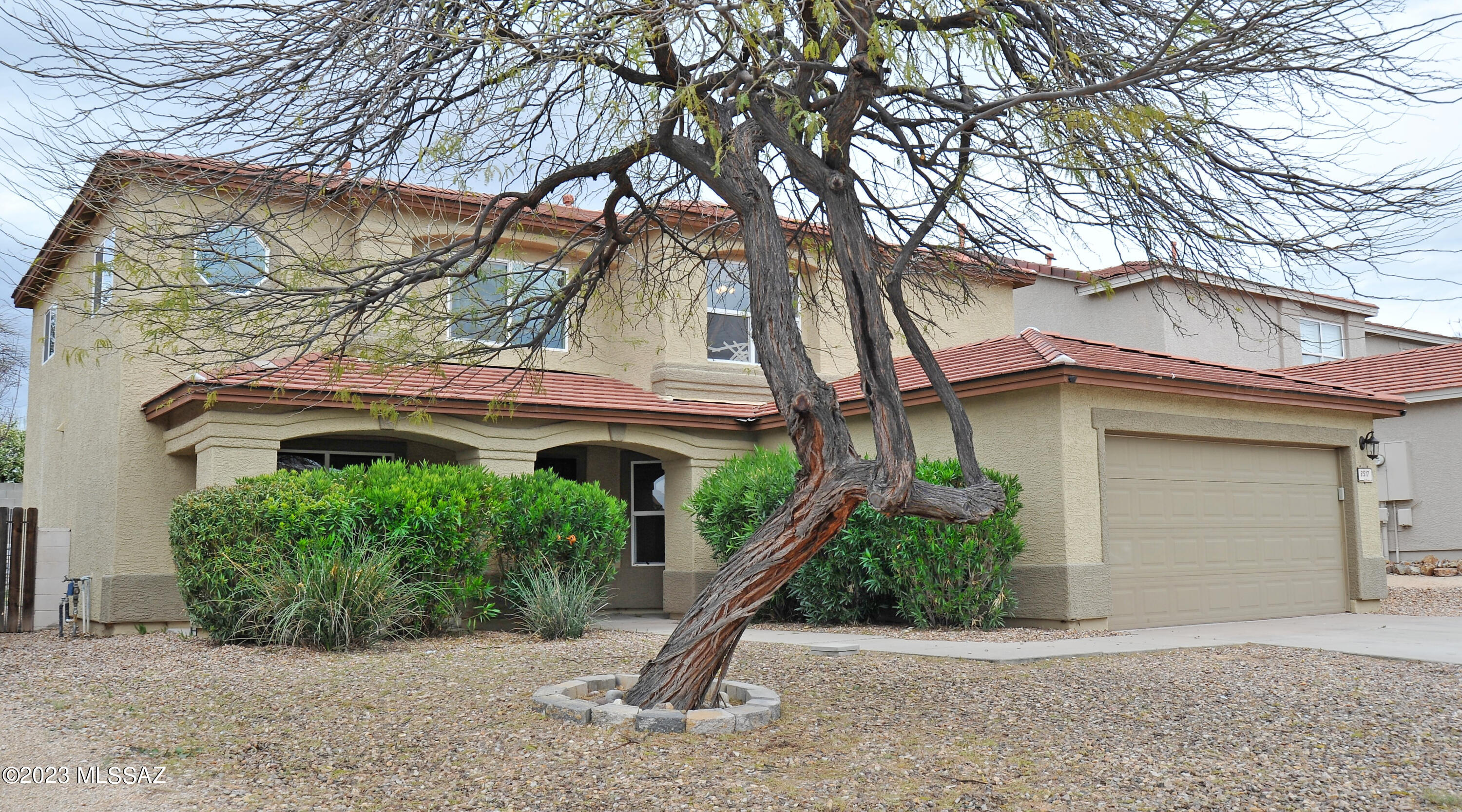 Need lots of space? This contemporary beauty has that with 2,886 square feet and 5 bedrooms/3 full baths. One secondary bedroom downstairs with bathroom next to it.  Serves as a guest room or that person that desires extra privacy. Huge master bedroom with large walk-in closet to go with it. Master bedroom balcony over looks the lush backyard. This one is priced right and just in time for the hot Spring and Summer seasons with your own private pool and spa. Great for the family and entertaining.