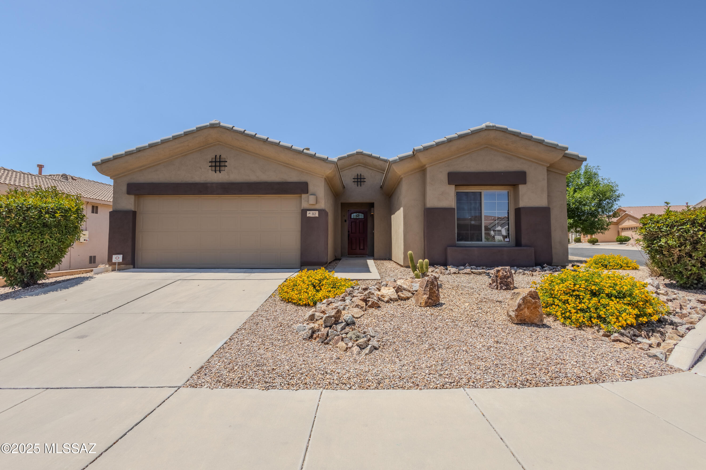 Welcome to this 1,731 sq. ft. 3-bedroom home in the peaceful La Joya Verde II community, offering access to a rec center, pool, and pickleball. Tile and carpet flooring flow throughout the open layout, featuring a spacious living area, a well-equipped kitchen with a raised dishwasher, electric range, and ample cabinetry, plus a connected dining area. The laundry closet with washer and dryer is conveniently located off the kitchen. Enjoy a beautifully landscaped backyard with a covered patio, ideal for relaxing or entertaining. The two-car garage includes overhead shelving for extra storage. Shopping, dining, and services are just minutes away!