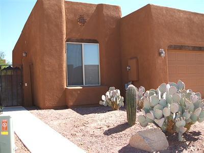 Built in 2002, this 3br 2ba adobe home situated in a quiet community features an inviting gated courtyard, covered patio, split bedroom floor plan, carpet/ceramic floors and landscaped front yard, walled back yard, wood beam living room ceilings, dining area in kitchen, kitchen appliances include refrigerator, stove, microwave, dishwasher, Laundry room with washer/dryer (electric) hook ups. Property includes refrigerator***RENTAL RATES REFLECT A $65 CONCESSION IN EXCHANGE FOR TENANT'S AGREEMENT TO CLEAN OR CHANGE HVAC FILTERS MONTHLY. ALL RENTAL RATES ARE $65 PER MONTH HIGHER THAN STATED WITHOUT CONCESSION.***