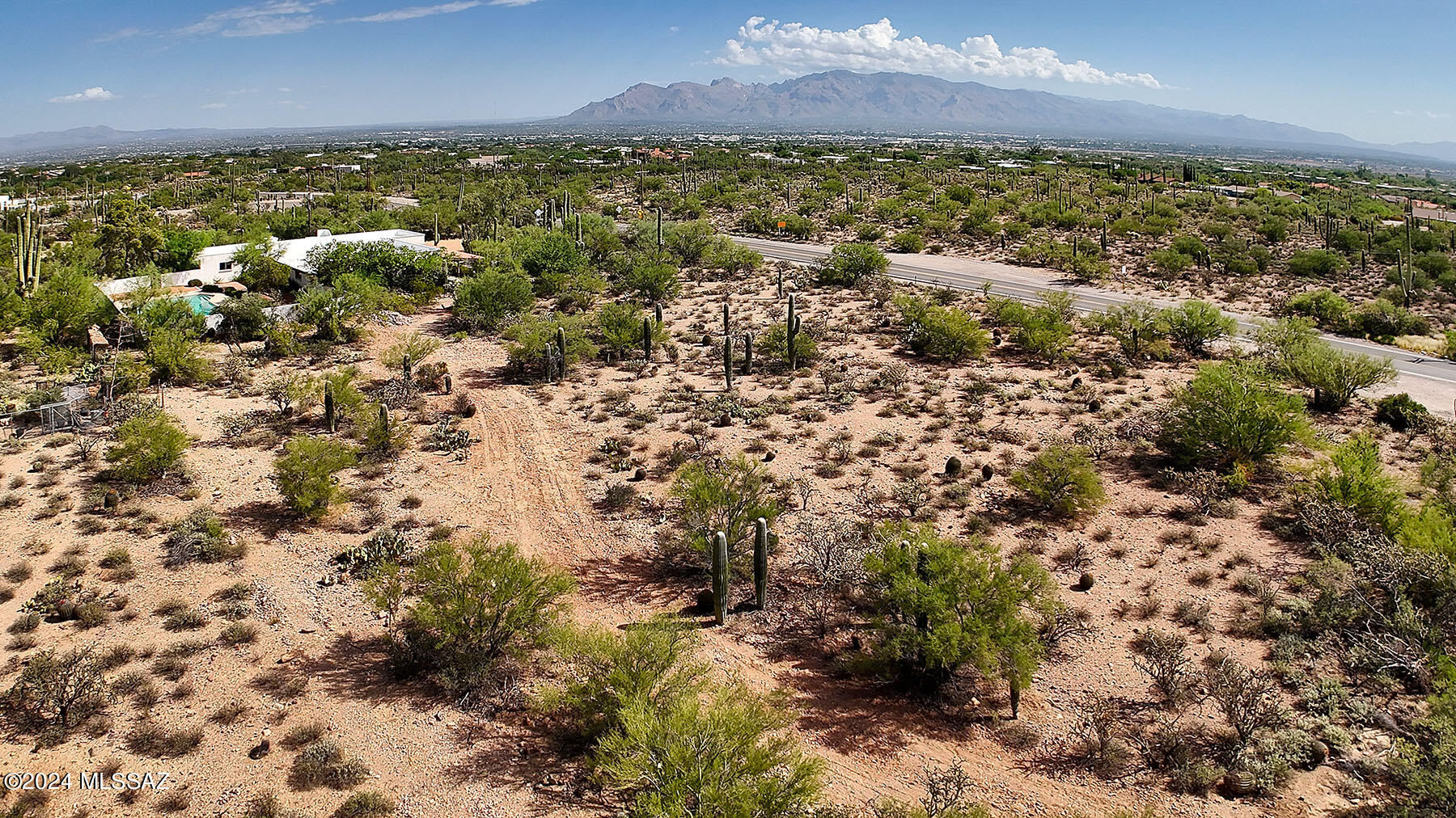 Beautiful 1 acre desert lot in a very desirable location in the Tucson Mountains. Close to nature and yet convenient to downtown, U of A, & Pima College. Located on the NW corner of Ironwood Hill Dr & Lloyd Bush Drive, the lot is flat and buildable with utilities at the street.