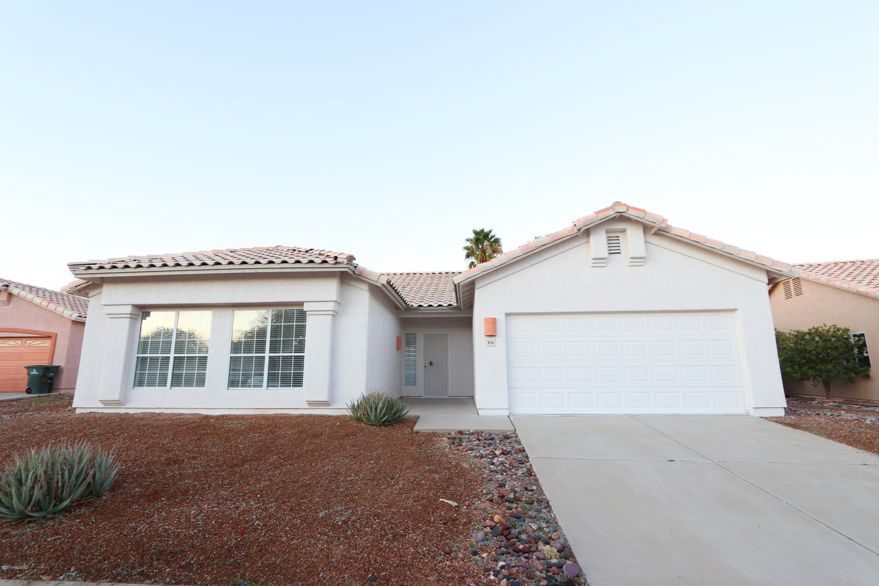 Bright and cheerful home with superior location in Rita Ranch.  Bustling community with grocery, shopping, dining and medical facilities yet close enough to walk to schools and parks.   Crisp modern kitchen, ceiling fans, spacious floor plan, soaring ceilings, contemporary flooring, fresh paint and more.  A must see!