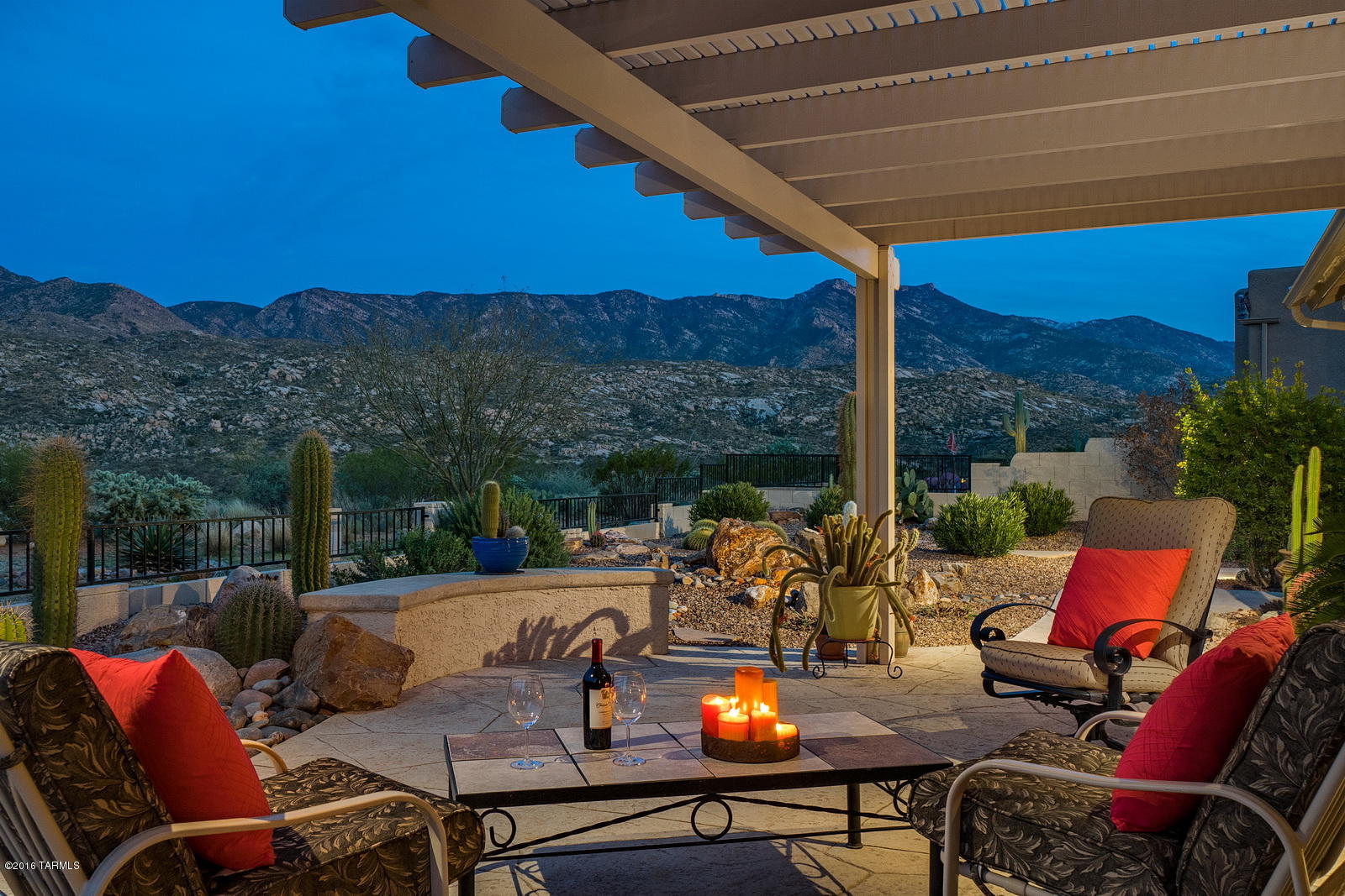 Nature lovers who crave privacy look no further than this immaculate Dakota model, boasting absolutely STELLAR Catalina Mountain views with only Sonoran mountain wildlife behind you. Whether enjoying your coffee as the sun rises, or reflecting during our famous painted sky sunsets, you will never take this special property for granted! Slip inside and continue admiring the views through the abundance of windows in this tastefully decorated home with a neutral color palette.  Two living areas, a dining room and gourmet kitchen (complete with gas stove, granite sink and counters) offer plenty of entertaining space.  Master suite features mountain views and spa like bath with walk in shower and separate soaker tub. Split bedroom floorplan ensures privacy from guest rooms. This is a MUST SEE!