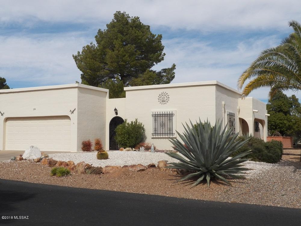 With many customary improvements completed, this spacious townhome is ready for immediate occupancy. Lovely 18 inch ceramic tile covers the entire home blending perfectly with the newly painted interior sporting a desert tan with crisp white trim. No popcorn on the ceilings either. New window treatments present a clean, finished look. A woodsy abandoned alley borders the rear yard providing natural habitat for variety of birds and wildlife. Only a couple of blocks to the Continental Shopping Plaza and West Rec Center. New HVAC unit installed 7/2016. Abundant storage in the 2-car garage, large laundry room and exterior closet.