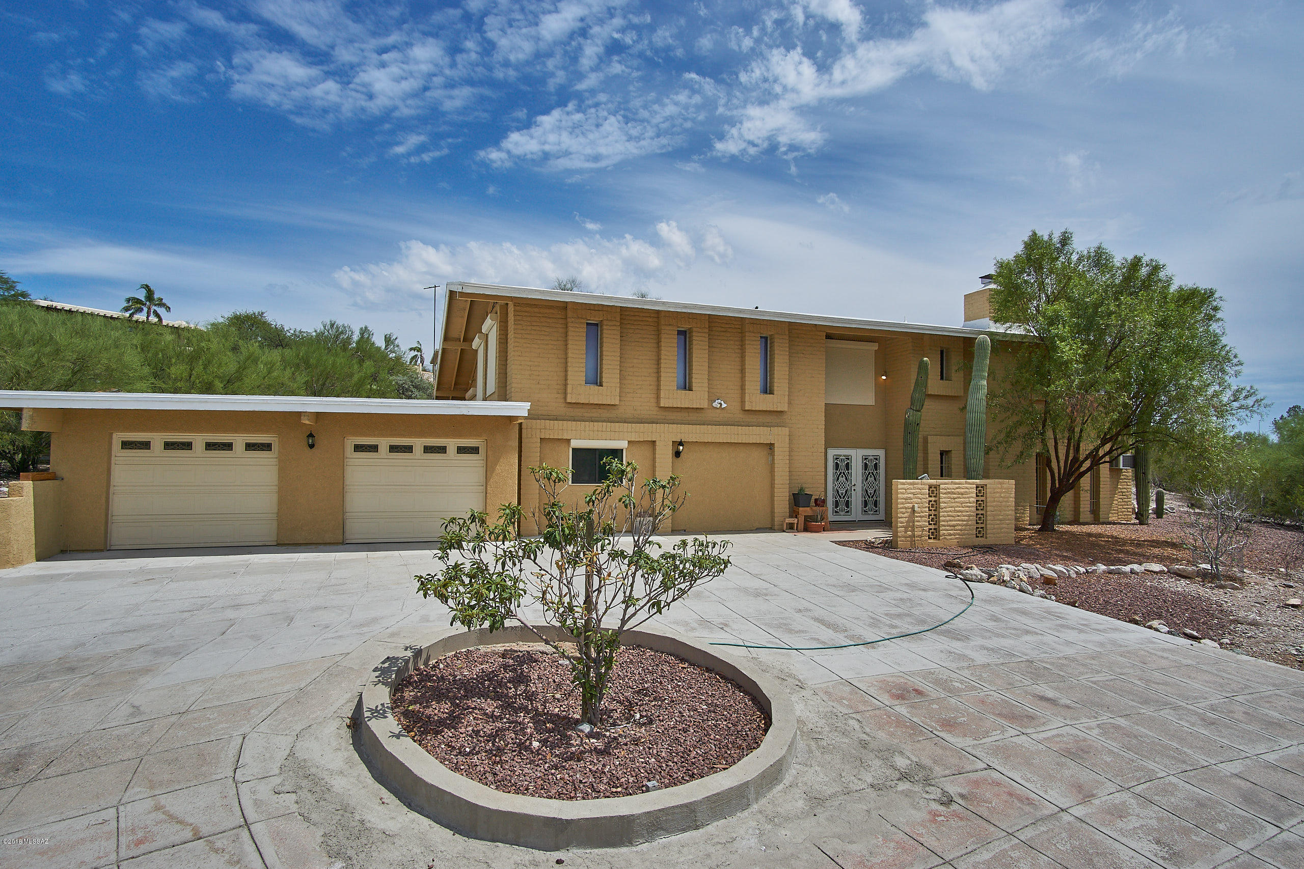 Great investment opportunity for rental, hold, or flip! Here's your chance to own a 3800+ sq. ft. home on almost an acre in the foothills with stunning direct VIEWS of the City and Mountains from both bedrooms and upstairs living area. The views are a must see in person! This property is in prime location. Upgraded comparables in the area in this square footage are selling in the $600,000's. The house can be purchased and held or remodeled and sold for top dollar. This property comes with many opportunities.