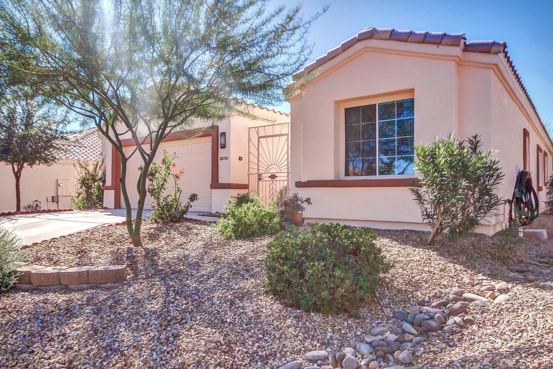 Gorgeous Desert Creek home with 3 bedroom, 2 bath and 2 car garage. 3rd bedroom with double doors can be used as den. Open floor plan with high ceilings and tile flooring except in bedrooms. Wonderful kitchen with island/bar, full pantry closet, pull outs and gas range. Lovely master bedroom with comfort luxuries such as a garden tub, separate shower, dual sinks, & walk in closet. Split floor plan gives privacy when you have guests. Ceiling fans in all rooms. Enjoy your coffee at the peaceful screened porch looking at the professionally landscaped backyard with fruit trees. Extended garage with tons of space for storage. House is in excellent condition and move in ready. All appliances included. Great location close to shopping and easy access to 1-19. Green Valley recreation membershi