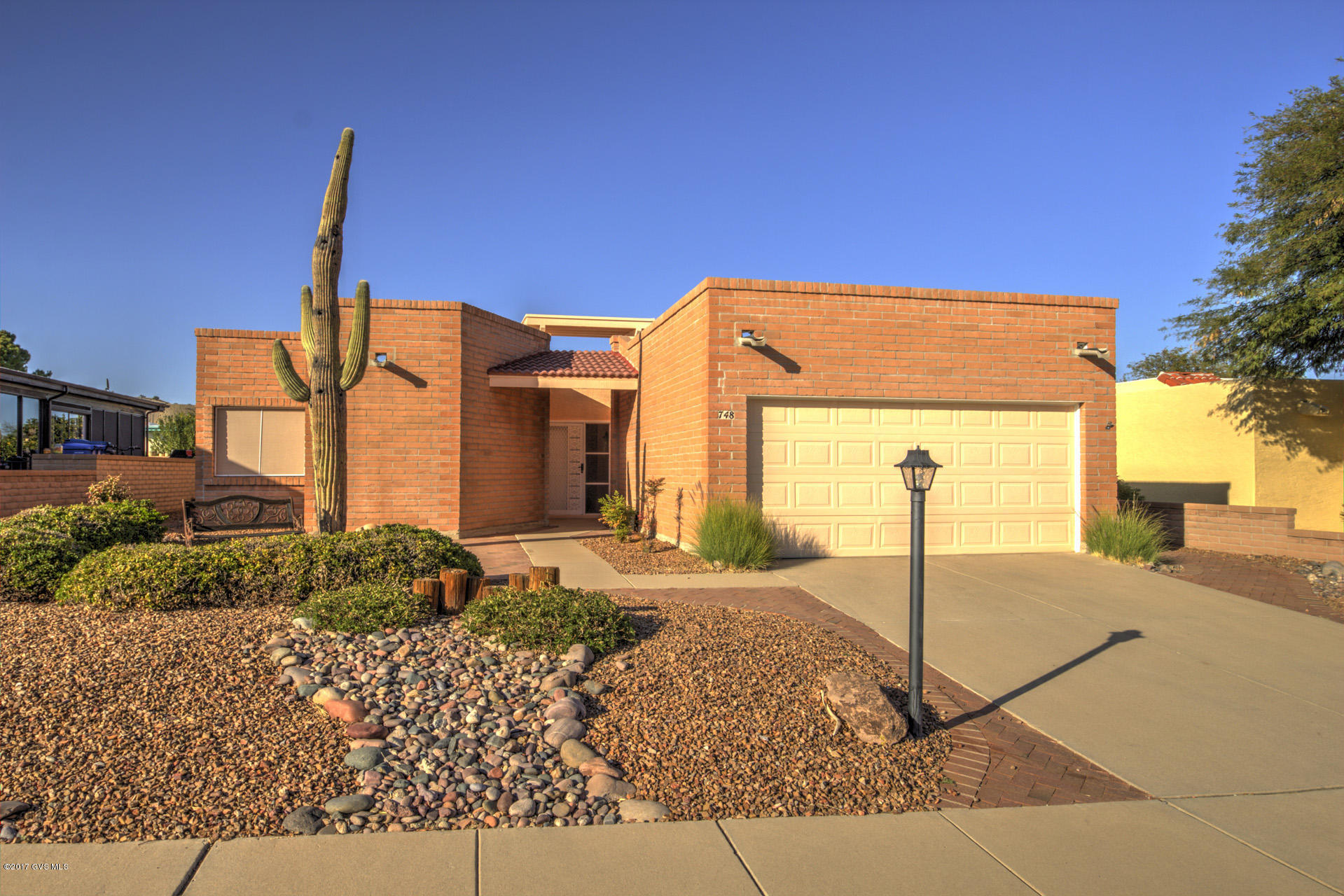 Absolutely gorgeous home has recently been remodeled with approximately $40,000 of improvements! New paint in soothing color theme, Bamboo flooring in traffic areas. Living rm has high ceiling & great lighting. Kitchen has a comfortable flow of space to living, dining & breakfast nook. Lg wrap around covered patio looks to back yard fully landscaped with mature fruit trees & plantings. In front is an attractive bricked patio area to sit & view the mountains. Excellent storage is a plus from the lg kitchen pantry, 2 walk-in closets & oversized garage. Improvements include, Diamond brand cabinets in kitchen and Baths, Kohler faucets, Quartz Kitchen countertops, Ceiling Fans, Glidden Diamond grade interior paint, GE Adora convection oven with upgraded large window & burners, (see more)  new 4'' wood baseboard throughout, upgraded tall elongated toilets. Front entry porch has new roof tile, paint, sensor light & new front door lock set. Also new electric outlets and switches throughout & new water shut off valves at all sinks and toilets. New garbage disposal. All the appliances in kitchen are new except the refrigerator. Trees are citrus and Pomegranate. Work space in garage.