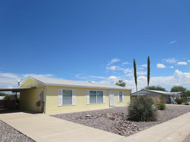 Bright and clean well maintained 3 bedroom 2 bathroom Manufactured Home. The property features an attached carport, private covered concrete back patio, separate storage shed with work bench and a large chain link fenced low care back yard. Conveniently located in a great neighborhood a few blocks from shopping, schools, medical and all city services. Completely furnished and ready to move in today!