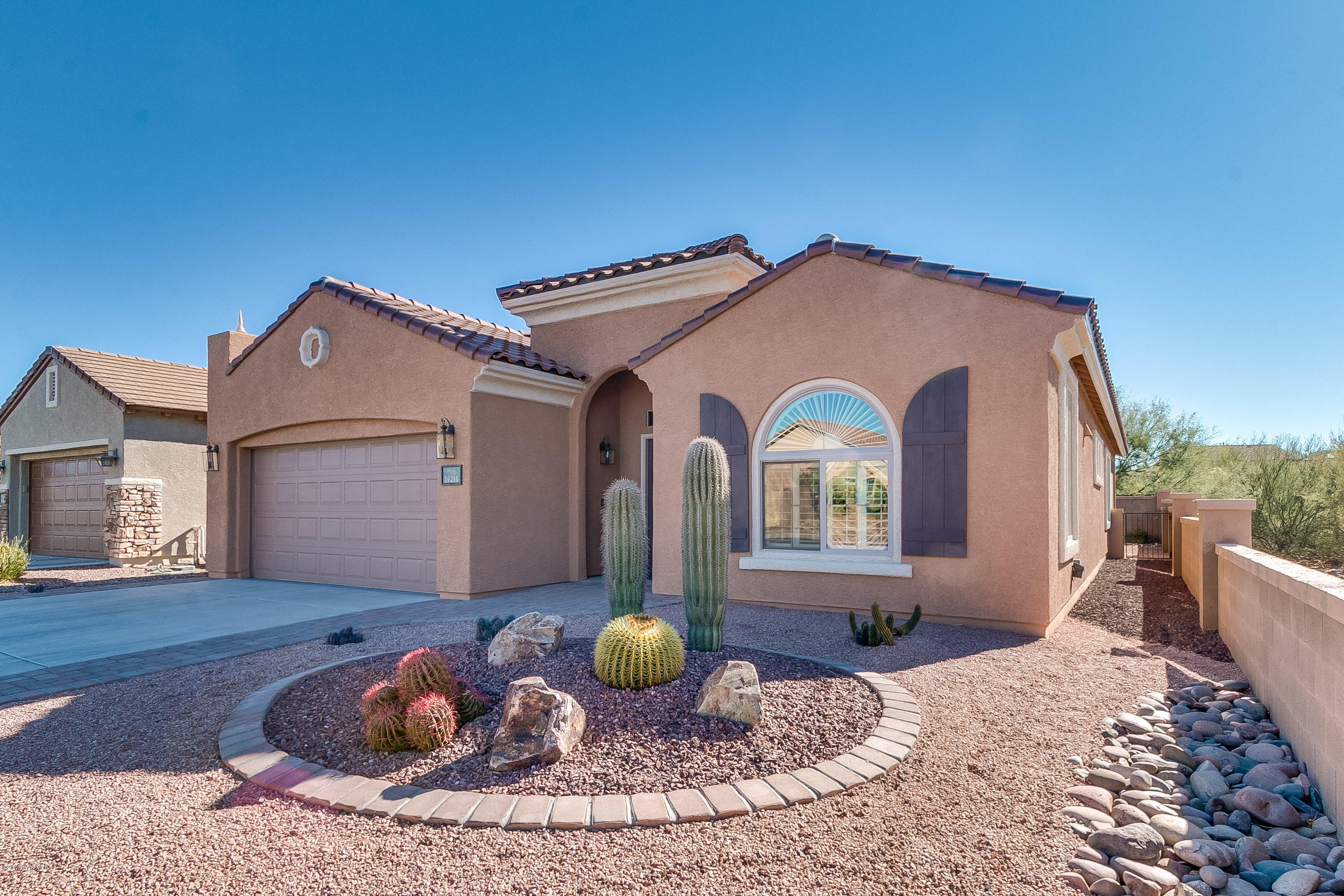 Sonora Living at it's very Finest! 2082 Sq. Ft. 2 Bed+Den 2 BA. This Arivaca Model is incredible, walk in the large foyer to a huge Great Rm/Dining Area,
 Gourmet Kitchen with S/S Appliances, Pantry Closet, Island w/storage and an abundance of cabs and counters. Sit in the Cozy kitchen nook and relax with your coffee and newspaper, the Mast BDRM may just be one of the largest you have seen in a long time, bay window, rm for seating, Bath has dual sinks exec height
 counter, enormous closet, sep. commode area, Split bedroom plan + den, laundry room/W&D stay, Screened in patio, lovely yard with outdoor kitchen, Upgrades galore in this fantastic home. Live in this active 55+ Community and enjoy two clubhouses, pools, spas, lake, wildlife, beautiful sunsets. Welcome Home!