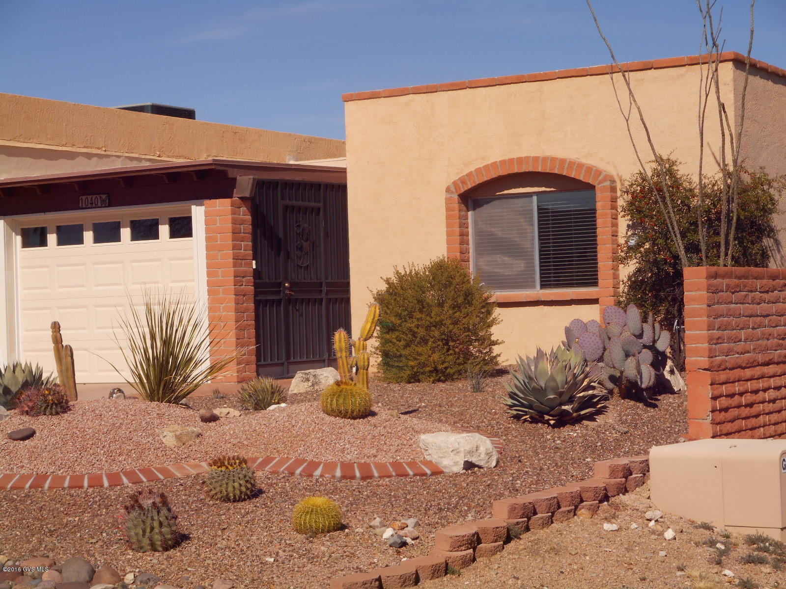 With views that will take your breath away, this COMPLETELY REMODELED TOP TO BOTTOM end unit townhome sits up high, accentuating the terrific views of the beautiful Santa Rita Mountains. You'll love the serene, quiet location close to golf courses and recreation centers, and once you step inside, you'll love the natural light, beautiful 20 ceramic tile set on the diagonal, very tasteful furniture, which is INCLUDED IN THE SALE, and the wonderful upgrades. The kitchen features new counters, stylish cabinets, and appliances, and both bathrooms have been remodeled with a close attention to detail. A cozy 3 season Arizona room, complete with ceiling fan and full exposure to those knock-out views completes this exceptional property. Truly, it's a JEWEL IN THE SOUTHWEST!