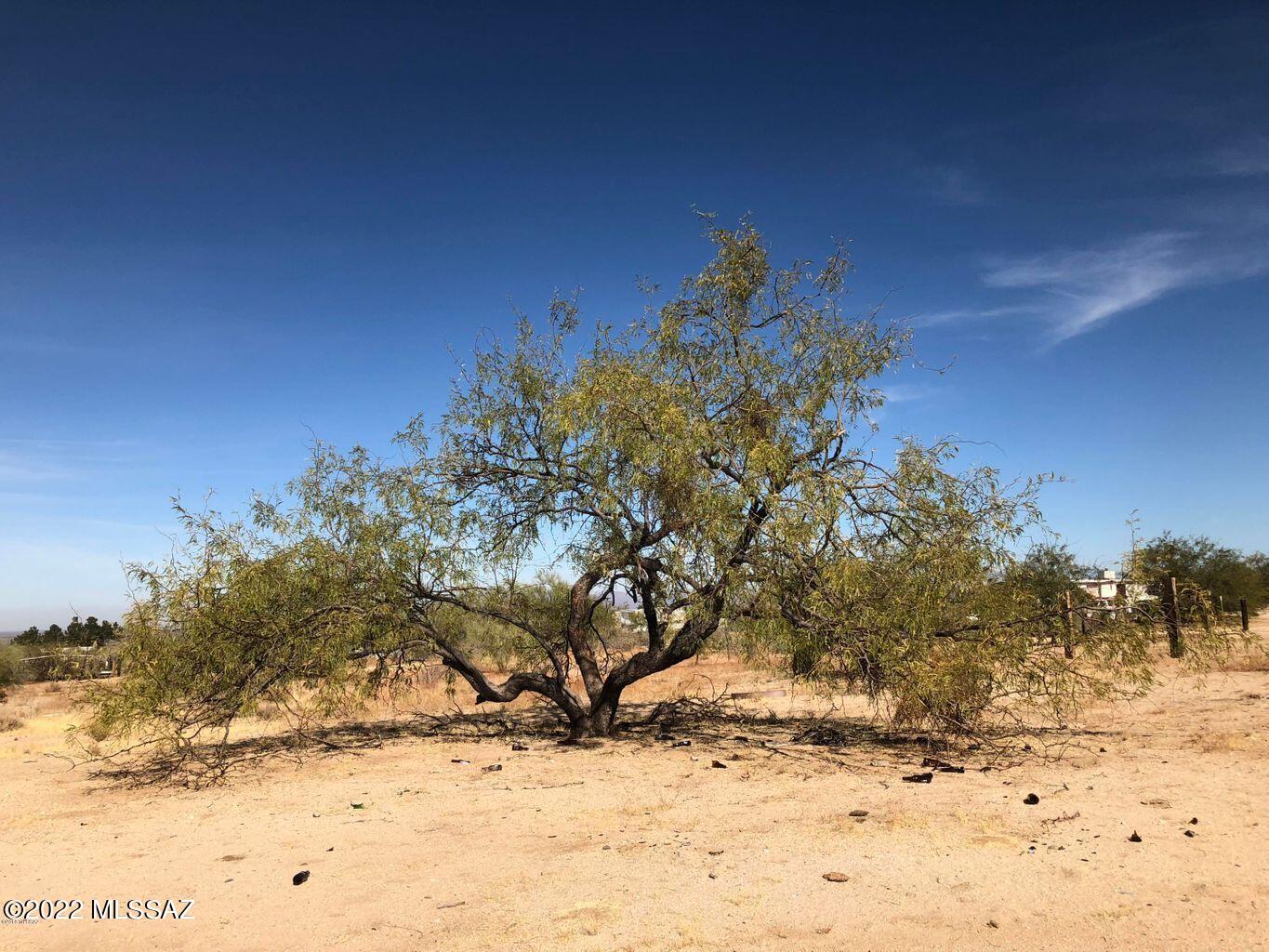 This lot has all utilities available! Well, septic, electric, ready for building in this rural area. Shorter dirt road to the subject parcel and beautiful views.