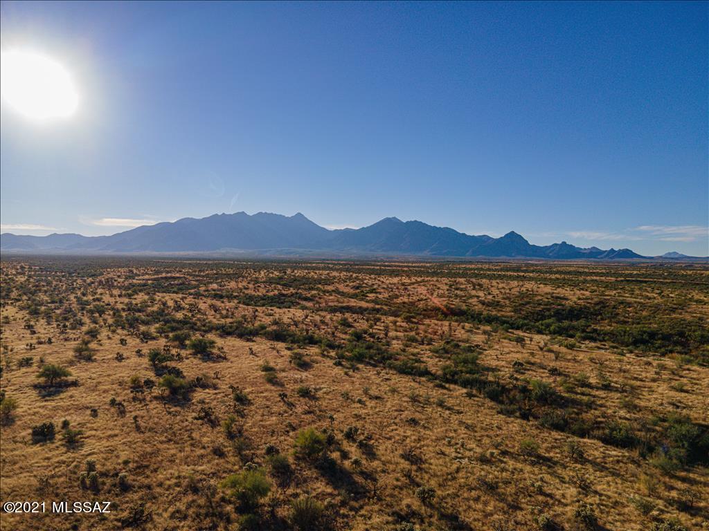 Enjoy the Stars with this Beautiful homesite in the scenic & gated community of Colonia Real! The elevated 1.51 acre lot is located in the foothills of Madera Canyon with acres of riparian conservation areas. Absolutely stunning views of the Santa Rita Mountains! Non-age restricted with underground utilities and cable available. Located conveniently to schools, shopping, medical facilities, and all of the Green Valley amenities.
Seller financing available-Call Listing agent for details!