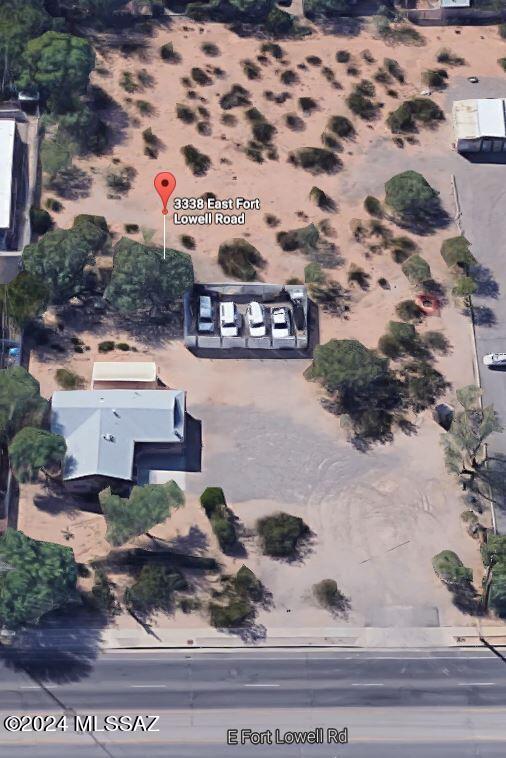 This is a rare find. C-1 zoned frontage with 60' of R-2 Zoned in the south portion of the land. SFR has been used as storage and office space.  Great for re-development or owner-user, so many options.

Broker/Owner