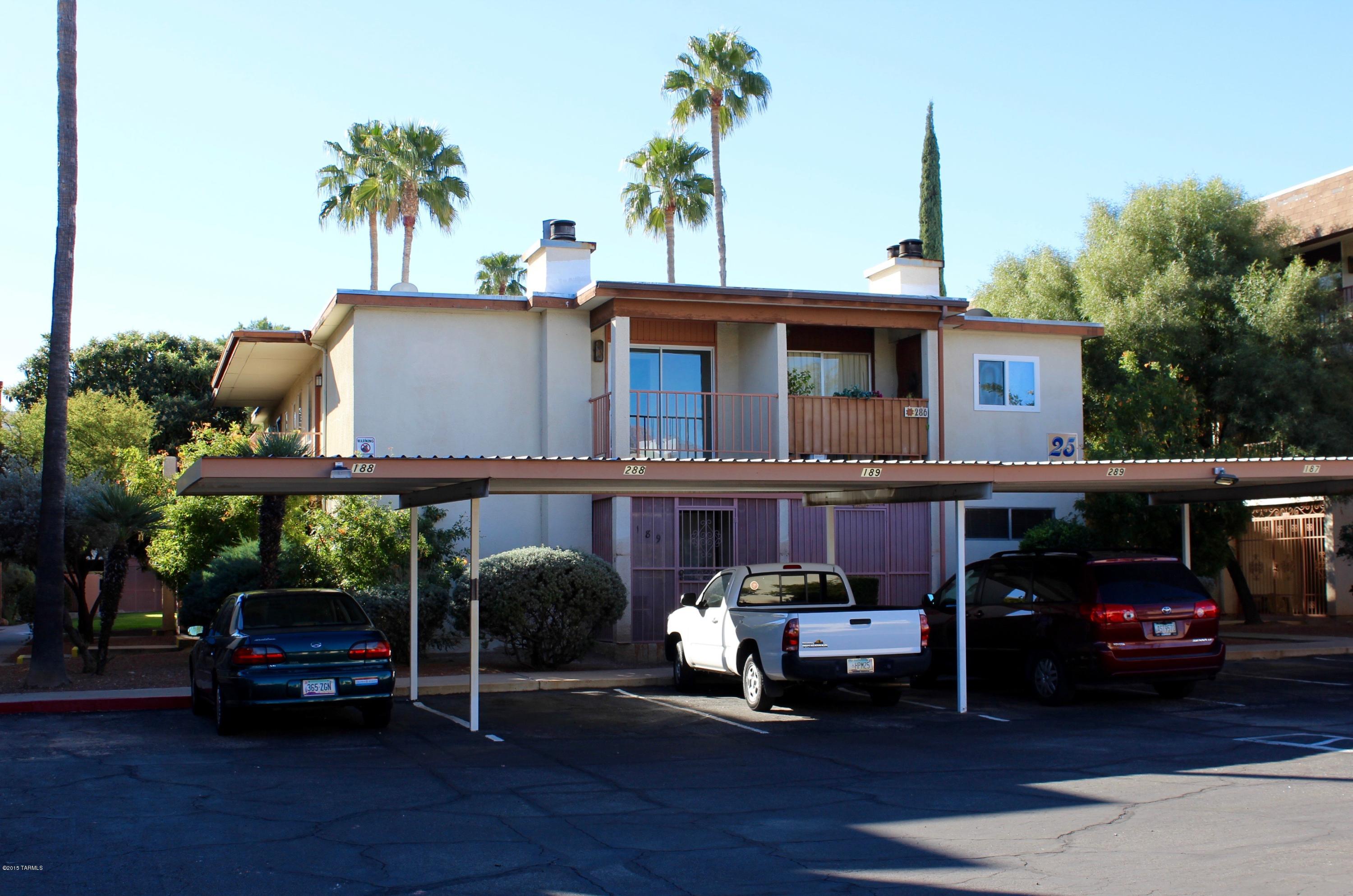 Terrific second-story unit in an outstanding NE location! North facing balcony has a beautiful view of Catalina Mountains. Striking wood flooring and freshly painted throughout. Great fireplace in living room and a brand new, energy-efficient, sliding-glass door. You won't find a better condo at such an affordable price anywhere in town!