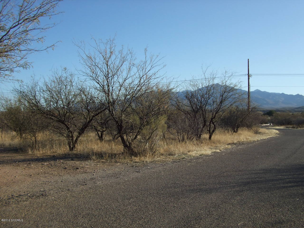 Located on the north end of the Tubac Valley Country Club Estates, this level building lot can be build on now or in the future with the builder of your choice. Close to the resort amenities & the Village of Tubac