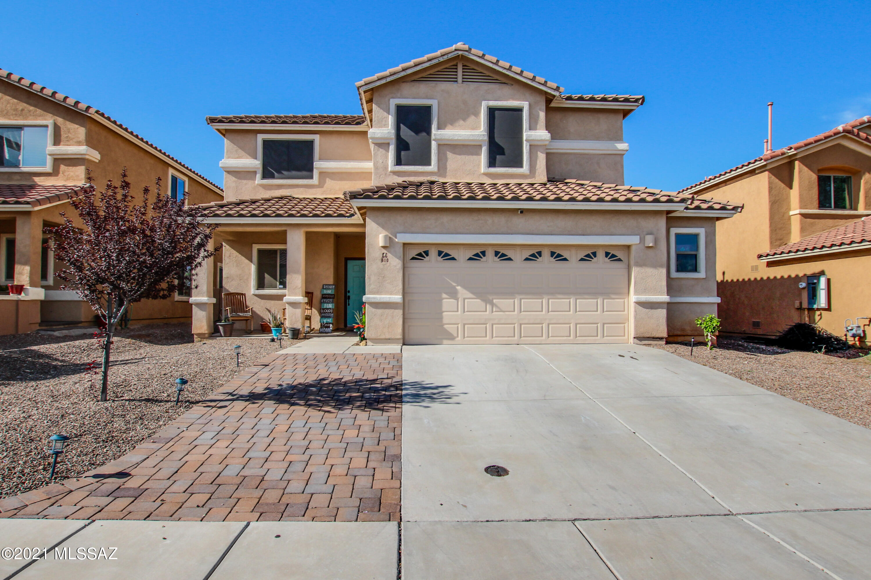 Gorgeous 2 story home located in the wonderful community of Rancho Sahuarita. Features 4 bedrooms, den, loft and 2.5 bathrooms. New flooring, NO CARPET and  updated owner suite vanities. Beautiful kitchen with SS appliances, breakfast bar and gas range. Spacious owner suite with large walk-in close and great views. . Backyard is professionally landscaped with artificial Turf, pavers and NO rear neighbors.  Enjoy all the amenities this community ahs to offer. 
A Must see!