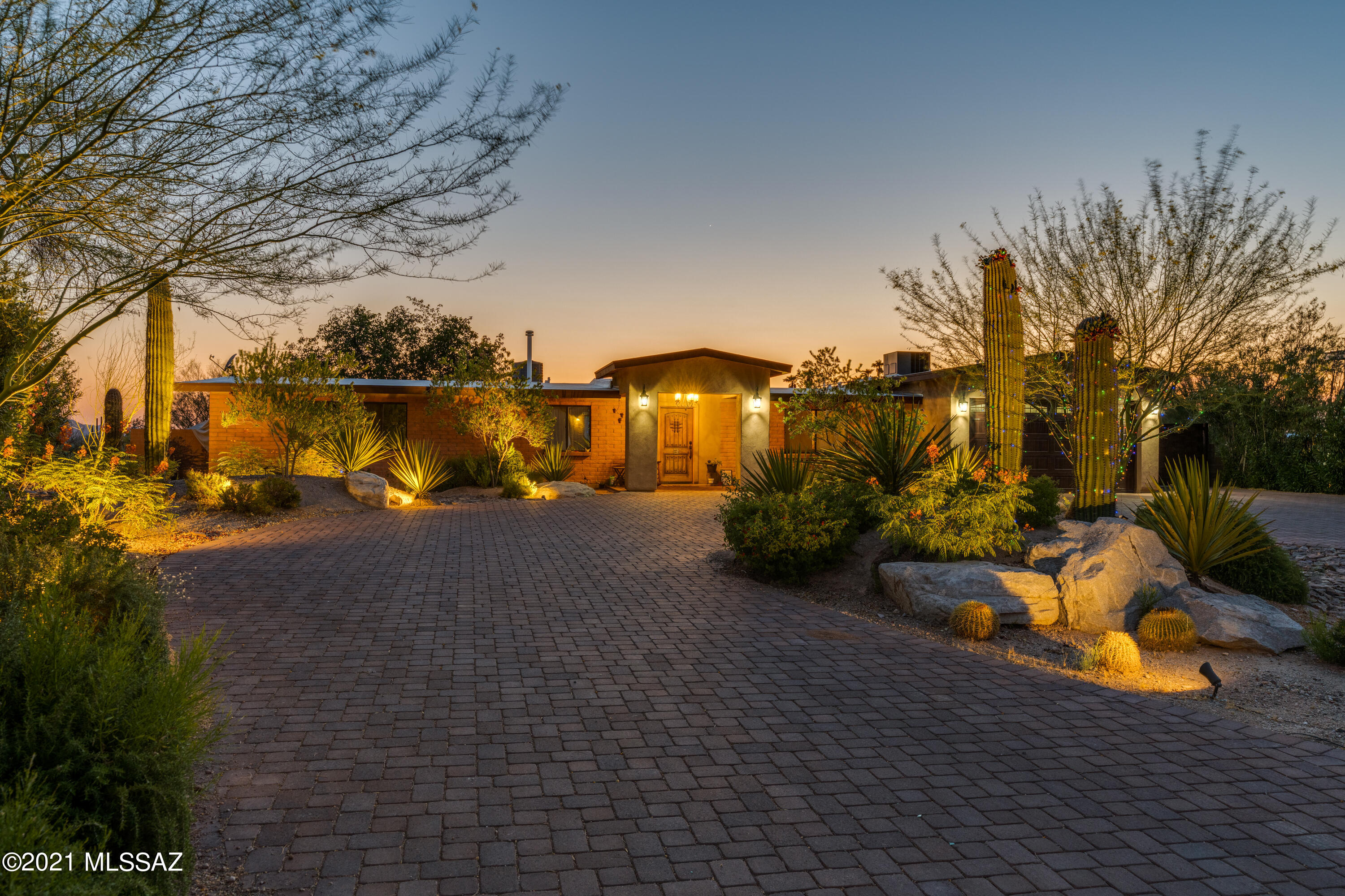 Amazing fully remodeled home in Northwest Tucson! This 4 Bed 3 Bath home has an amazing pool and outdoor entertaining area, 6 car garage huge kitchen, amazing custom features throughout, plenty of room for an RV and lots of toys and so much more, has to be seen in person to believe it. Custom cabinets throughout, custom built in closets, dual heating and cooling an amazing detached 4 car garage and beautiful curb appeal. This home has been fully remodeled inside and out.