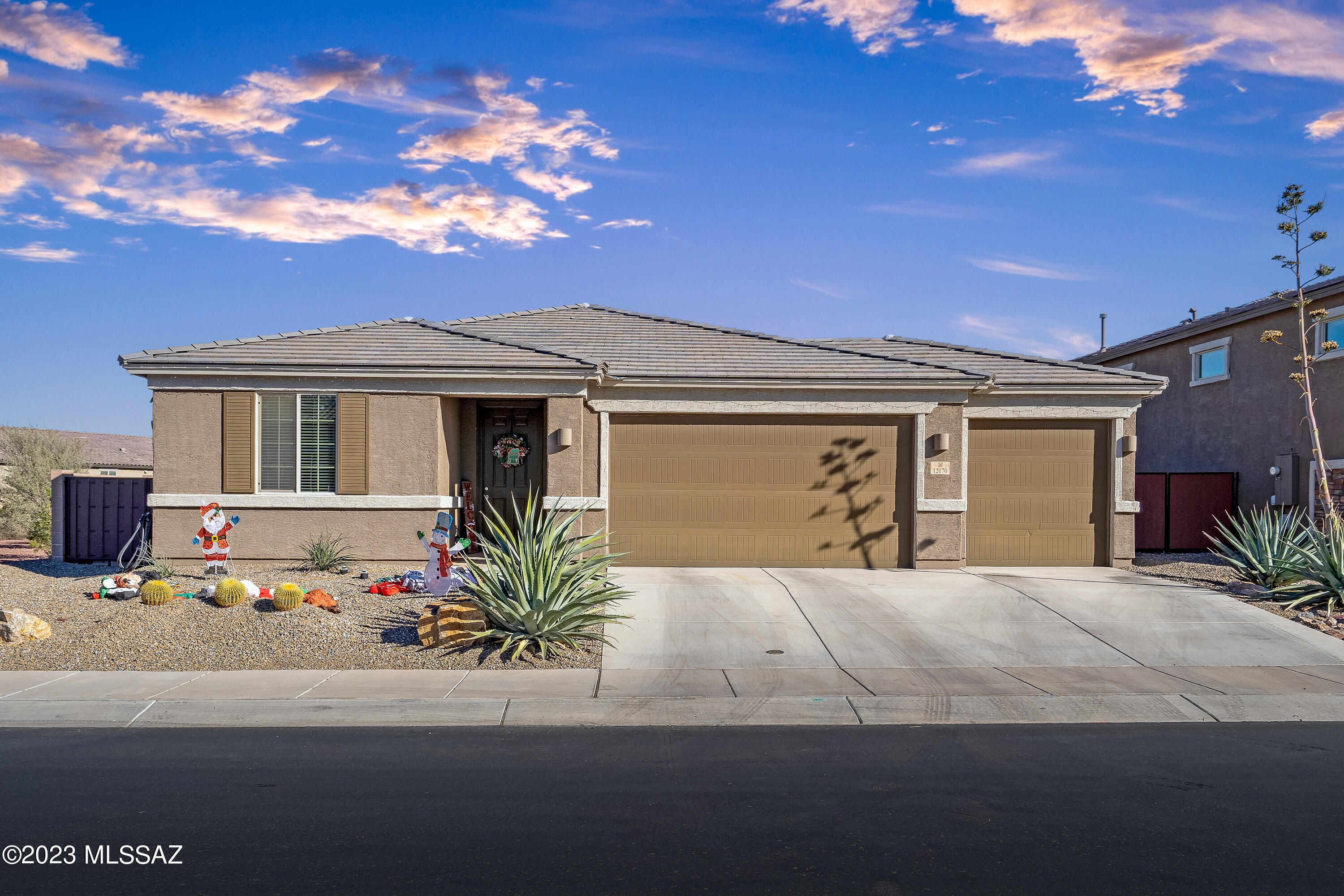 Better than new, this is the one! 4 bedrooms, 3 FULL baths, and a side by side 3+ car garage with extension on back for workshop/gym/etc.  So many extras make this 2019 Richmond home one of a kind.  Gourmet kitchen with extended white cabinets, quartz counters and stainless appliances. Huge walk in pantry. Great split bedroom floor plan with guest suite in front of home. Perfect for visitors or teen. No neighbor to the North and east facing blank slate backyard for cooler evenings. Gladden is getting a new Fry's in late 2024. You will be able to walk to it from this home.