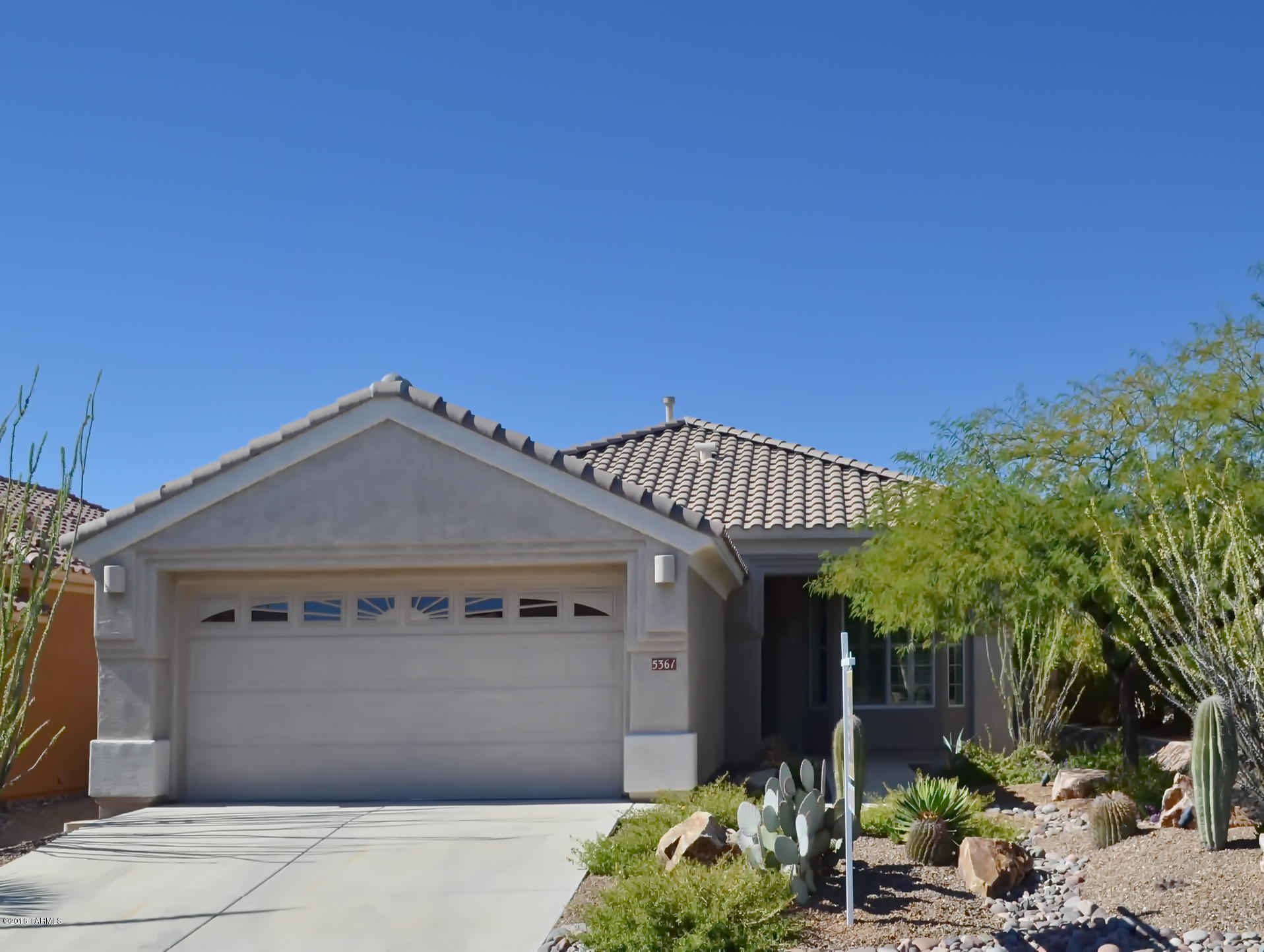Gorgeously upgraded highly desired Durango model home in The Highlands. Kitchen and both bathrooms beautifully updated. Home highlights includes tile flooring throughout entire home, plantation shutters, new ceiling fans in all rooms, beautiful kitchen granite counters, maple cabinetry, custom backsplash, gas range, dual closets in master bedroom,fresh interior home paint & interior of garage, 3 bay windows (dining nook, master bedroom & guest bedroom), new water pressure regulator, paver patio w/gas stub connection. Backyard extended porch and patio area is beautifully landscaped with mountain views. Private and serene location.  Home is truly move-in-ready w/both kitchen and laundry room appliances included w/accepted offer. Gorgeous home - crisp, clean, bright & stylish.