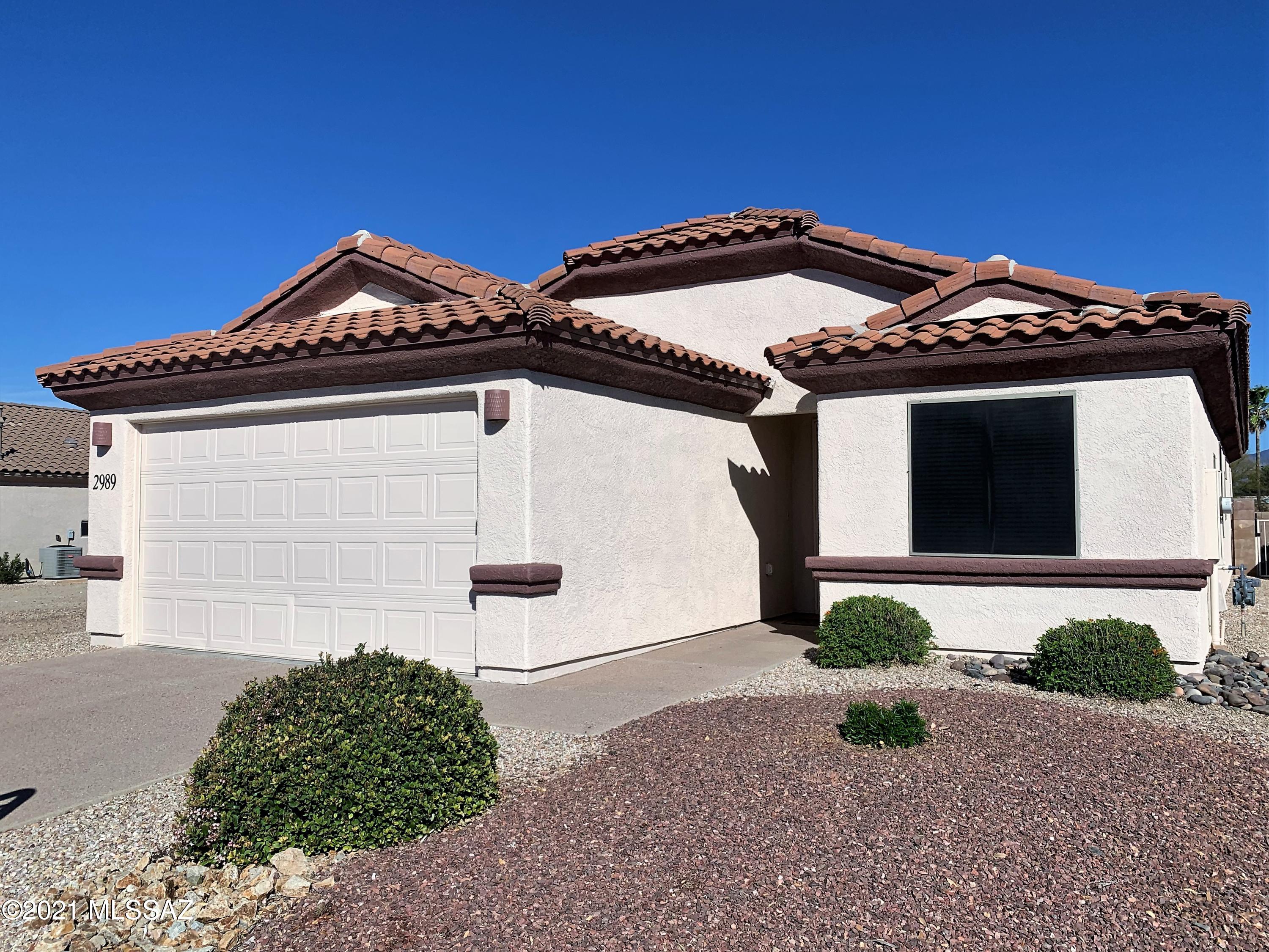Beautiful, open floor plan with mountain views and one of the few homes on market with a pool! This 1744 sf home has everything you want: 3 bedrooms, 2 baths, functional great room with large
island for entertaining, dark granite countertops, warm neutral tile, and ample storage in the maple café cabinets and matching desk. Stainless gas stove, dishwasher, and side-by-side fridge. The living area has a TV alcove and inviting gas fireplace. The master suite has a large walk-in closet, executive height countertops, and dual sinks. In addition to the sparking pool with views, the backyard has a covered patio, built-in BBQ with minifridge, and pavers to bring gatherings outside. Life doesn't get any better than this!