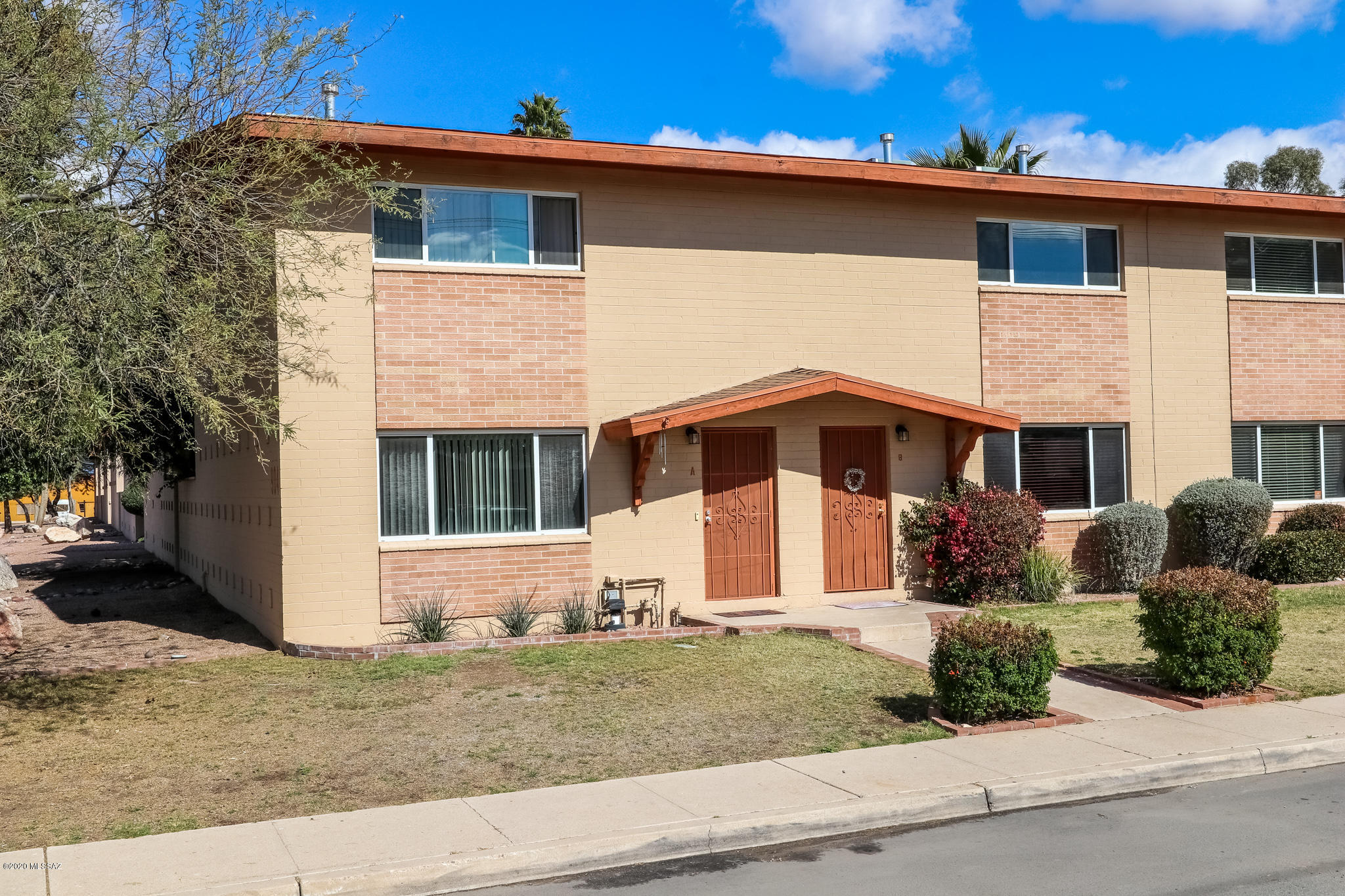 Extremely well cared for 3 bedroom 1.5 bath condo in the heart of central Tucson. all appliances stay! Large kitchen with center island. Open French doors to beautiful back patio with a deck and privacy. This condo is close to shopping and 2 miles to the U of A. Come and see before it is too late! OPEN HOUSE SCHEDULED FOR SUNDAY FEBRUARY 16, 12 PM-3.