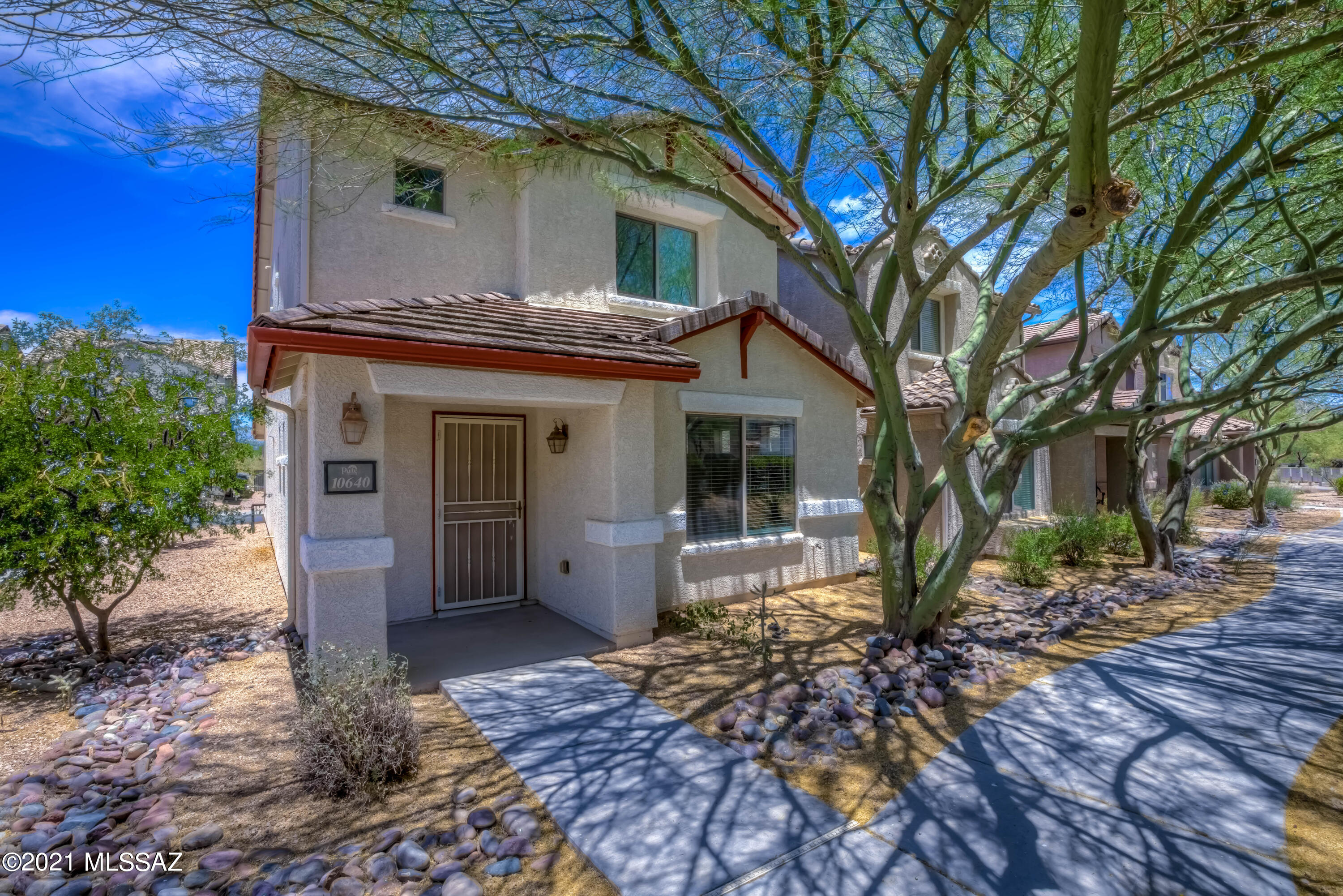 Beautiful home in the wonderful Sierra Morado community! This 3 bedroom, 3 bathroom. The downstairs kitchen/dining/living areas are spacious and open concept. The upstairs has 2  bedrooms, a laundry room and a very spacious master suite! The green features in this TEP Guarantee home are going to put money in your pocket! The home is equipped with solar power panels and a solar hot water heater to keep your utility bills low! There is a 2 car garage and nearby extra parking. Come enjoy Sierra Morado's community center, community pool, kids playground, along with walking trails, bike paths, parks, and dog park.