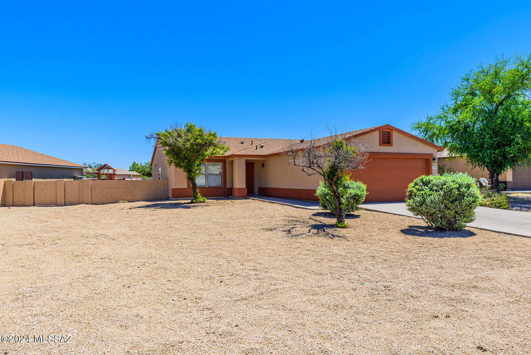 Lovely home on a spacious corner lot, this meticulously maintained 3-bedroom, 2-bathroom  is a homeowner's dream come true. It is a prime location 3.5 miles
 from Tucson Marketplace & Entertainment.   It is about 6 miles from the University of Arizona and Downtown.
 Step inside to discover a blend of modern updates and timeless charm. Both bathrooms have been renovated and a new roof 2 years ago. 
 Stainless steel, fridge, stove, microwave and dishwasher.
There is easy access to I-10, ensuring effortless commutes and endless adventures.  Don't miss your chance to make this suburban sanctuary your own and prepare to fall in love with your new home sweet home.