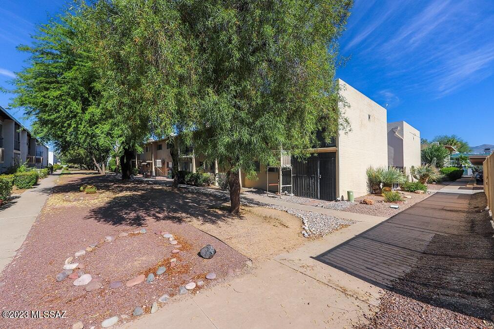 Central Tucson 2BD/1BA upstairs co-op condo.  Updated floors and doors, new paint. Kitchen completely updated with copper ceiling tiles & copper farmhouse sink, all appliances stay! Solar tubes. French doors lead out to enclosed patio  which can be used as an office, media or craft room. Bathroom updated with tile shower backsplash and vanity. HOA covers water,  sewer, trash, taxes & exterior maintenance. On site laundry facilities. 2 community pools. Close to Reid Park (walking paths, zoo, golf course, tennis courts, dog park). Shopping, restaurants & transportation nearby. Minutes to downtown Tucson and the UofA. Cash only/no rentals. Must pass background check/board approval. Come and take a look today!