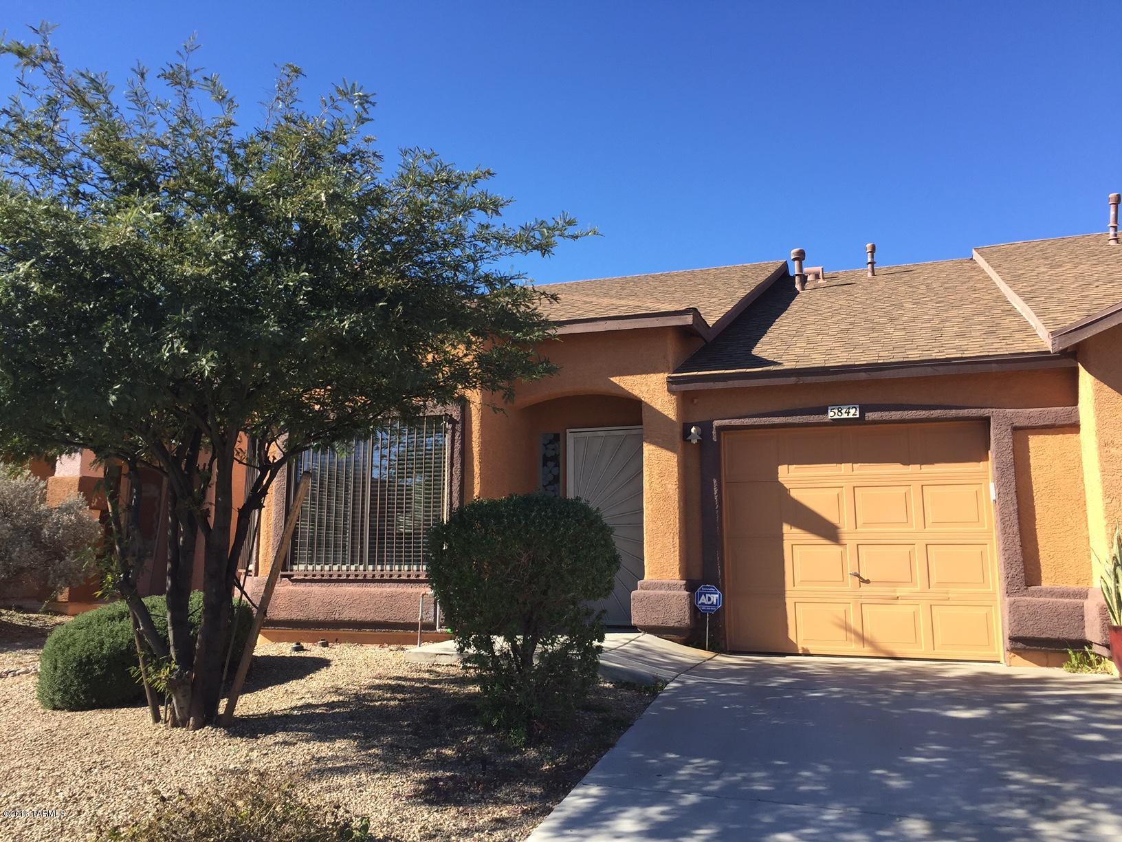 two Bedrooms, 2 baths, gourmet kitchen, cute dining area & great room. carpet & tile flooring, newer appliances, A/C, private yard w/ cov patio, oversized 1 car garage , close to schools, shopping,and parks.