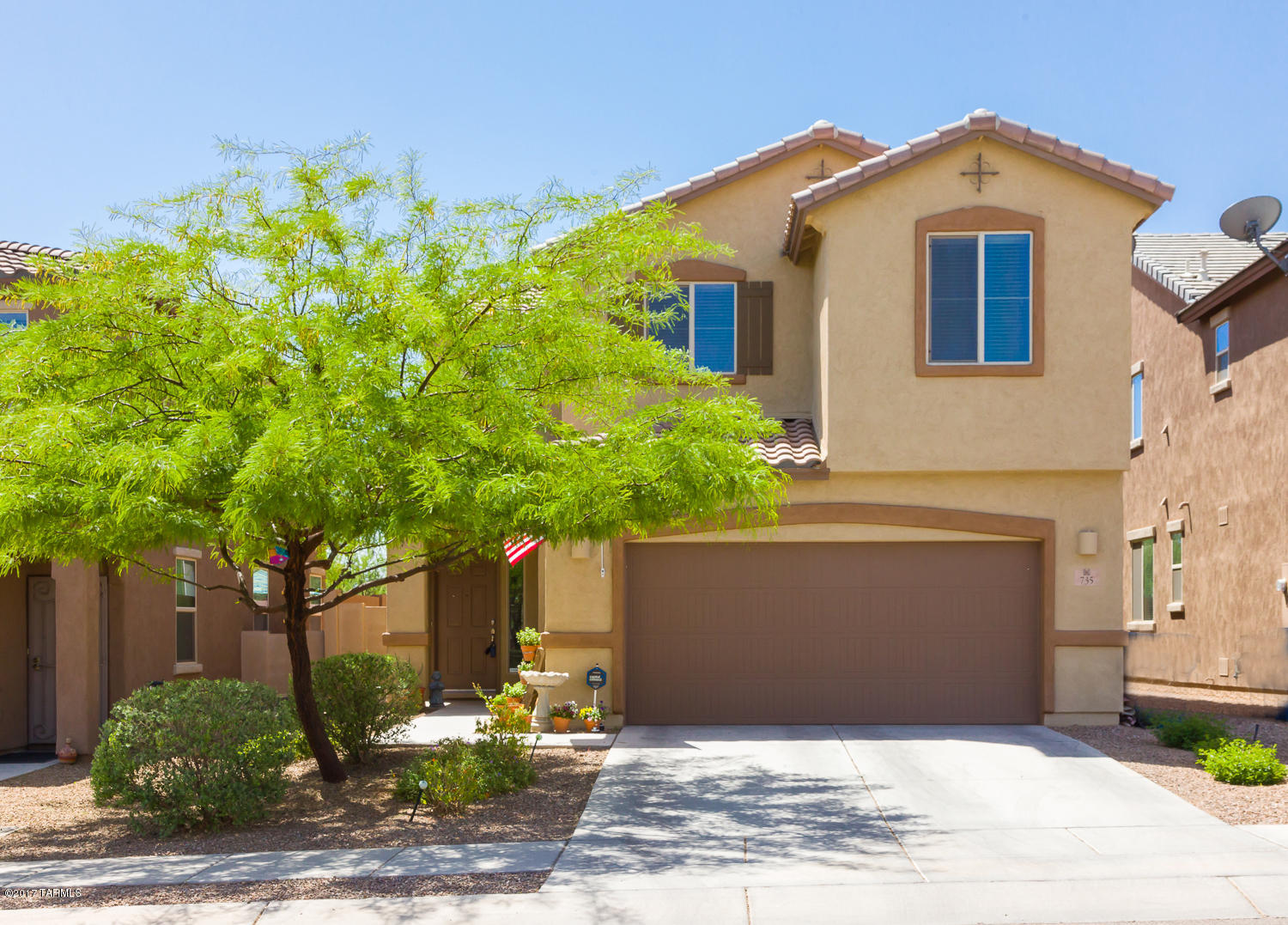 One of Richmond American's most popular floor plans located in a prime spot in Rancho Sahuarita. Just down the street from the community pool.  No neighbors behind the house, fully landscaped back yard with artificial turf, custom brick pavers and so much more. From the moment you walk through the front door, you will be greeted with a wide open floor plan that opens to a luxurious kitchen complete with island, pendant lights & tons of storage. There is a den/office, potential extra room down stairs as well. Upstairs, you will find a super sized loft, large master bedroom bathroom combination that includes a very large walk in closet, walk in shower, dual sinks and pantry. Two more bedrooms, a guest bedroom and the laundry room complete the upstairs.