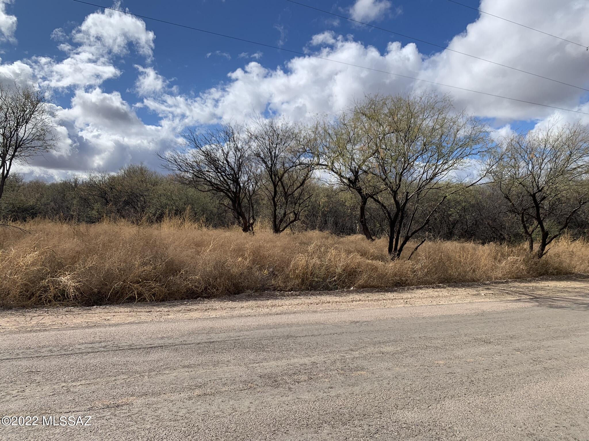 Fairly level lot. Homes in all directions. Utilities should be at the street but should be verified. mountain, rural and hillside views surround property. Sellers related to listing agent. See Documents for additional information.