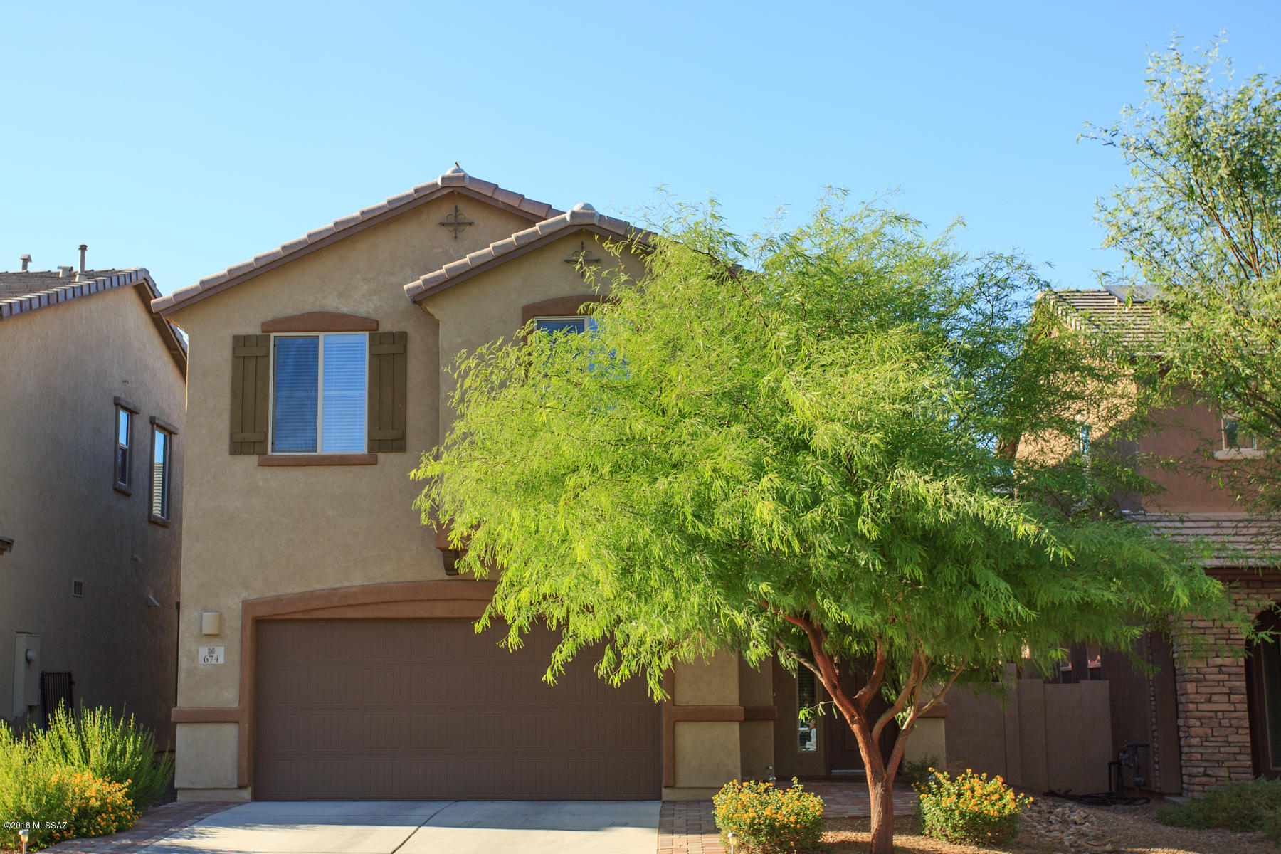Beautiful 3 bedroom 2 bath home with a spacious loft. Tile throughout the downstairs. Kitchen has granite countertops and stainless steel appliances.  Washer and dryer convey with the property.  Extended patio with decorative rocks and desert plants in backyard. This home is just steps away from Rancho Sahuarita's North Pool and Park.  This home is move in ready with neutral paint colors throughout and freshly cleaned carpets before listing.  Come see your next home today!