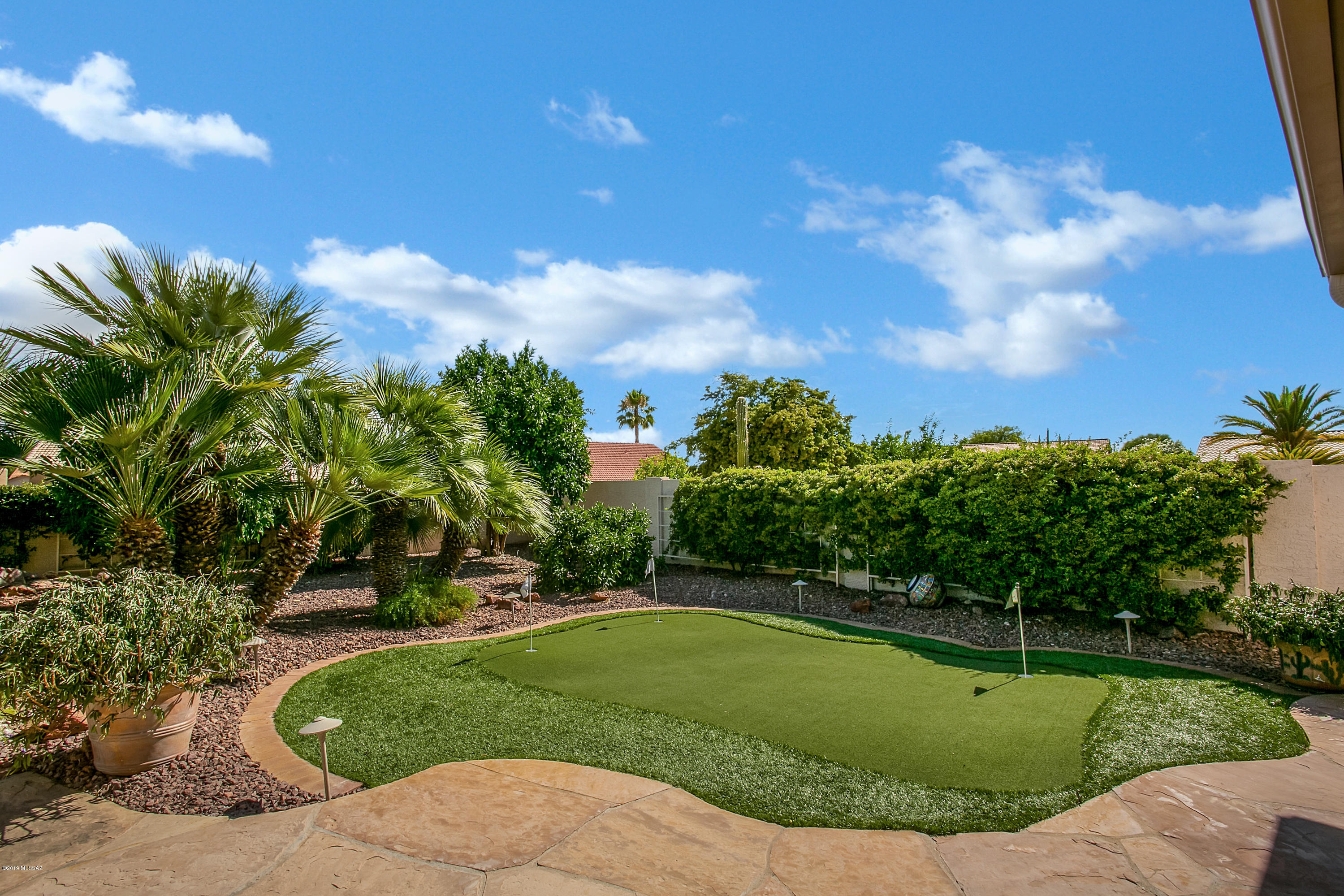 If there is an upgrade, this Durango has it! A private back yard with beautiful mountain views! Casita with tons of built in cabinetry, 2 wine coolers, bar sink & steam shower. Entrances have iron doors & the 3 car garage has a 6 ft ext. with storage cabinets galore! 2 fireplaces & a fire pit add ambiance. A full length patio & outdoor kitchen are perfect for entertaining. The den and family room are full of built-ins & all the closets have closet systems. The master bath has a double head walk-in shower and executive height vanities. The gourmet kitchen includes 5 burner gas cook top, roll outs in all the cabinets, beverage fridge and so much more! See the upgrades list in the document file for a full explanation of the benefits of this fabulous home! MUST SEE!