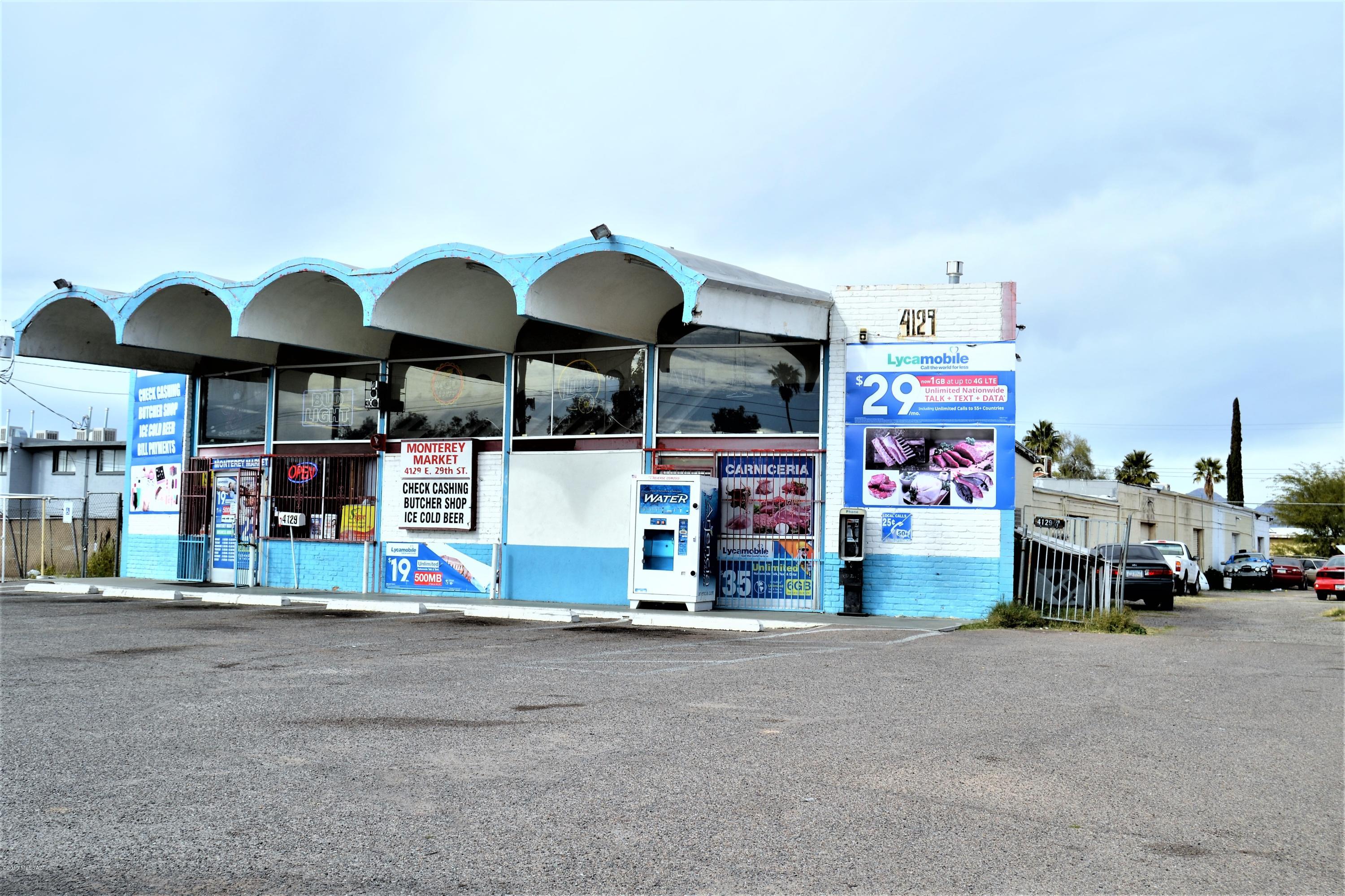 Convenience storefront and mini storage lot.