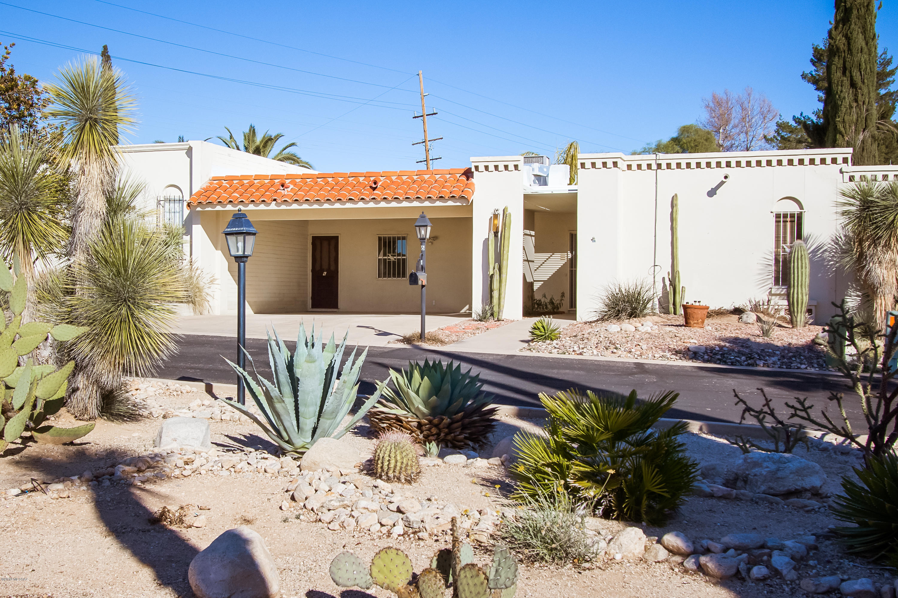 Be the first to see this newly renovated townhome in the desirable Casa Blanca subdivision. Its proximity to shopping, restaurants and entertainment is unbeatable. You can even leave your car at home! This updated home features all new flooring of a combination of tile and carpeting, new granite counters in kitchen and baths and new neutral paint. It boasts old world charm with a new modern look. With 1596 sq ft, this 2 bedroom/2bath townhome is spacious. It includes a large separate laundry room with a separate entrance to both the carport and the backyard. The backyard has a covered patio and plenty of room to create your own private garden. The community pool is just a short walk away. This home has it all, come make it your own!