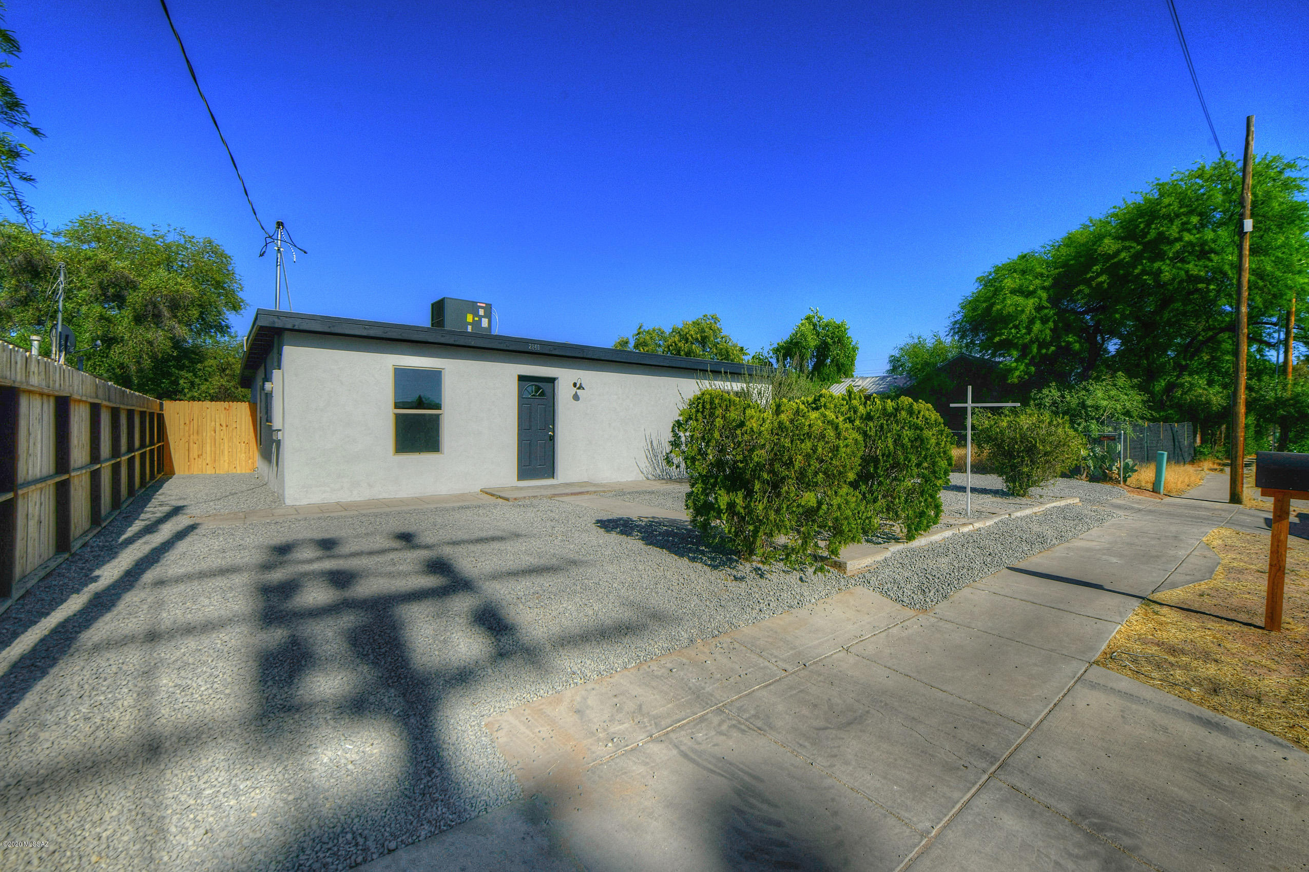 MOVE IN READY!! Remodeled SFR April 2020. This marvelous home is a comfortable 1677 sq ft. Located minutes from U of A & restaurants giving you access to fine dining and fun! Highlights include two tone paint inside and outside, ceramic wood looking tile throughout common areas, brand new carpet in bedrooms, brand new dual pane windows. Kitchen features dual sink, brand new cabinets w/beautiful Granite counter tops & new stainless steel appliances. Bathrooms have brand new vanities, dual flush toilets & tile surround shower w/decorative accents. Home has brand new (April 2020) AC that blows super cold air! Don't miss out on such stunning home!