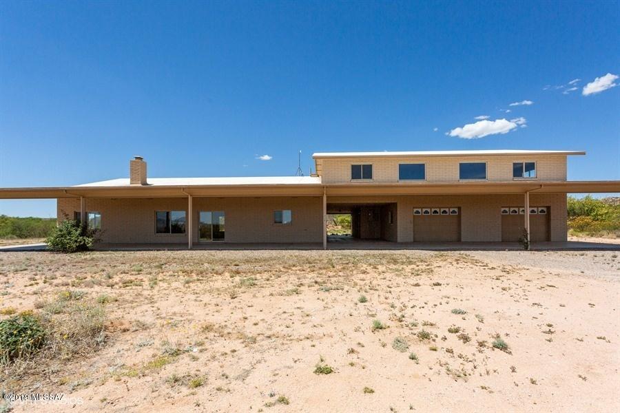 WOW!  Some big ranch living can be done here! * Approx 5600 heated and cooled livable square footage * 3 bedrooms 2 bathrooms down stairs * Large open living area, 1 bedroom and bathroom upstairs and an office room, bathroom and laundry (heated and cooled) in the garage area * 4 car - 3 door garage * All on nearly a 20 acre parcel * Current seller has renovated the home to include finishing upstairs living space with heating and cooling, flooring, new fixtures etc... * Downstairs the kitchen includes granite counters, new appliances & fixtures * Throughout includes fresh 2 tone paint * light & plumbing fixtures, window screens, repairs as needed, etc.... * The home is move in ready! * Owner of record is Fannie Mae * For more information about purchasing a Fannie Mae HomePath property go to HomePath.com