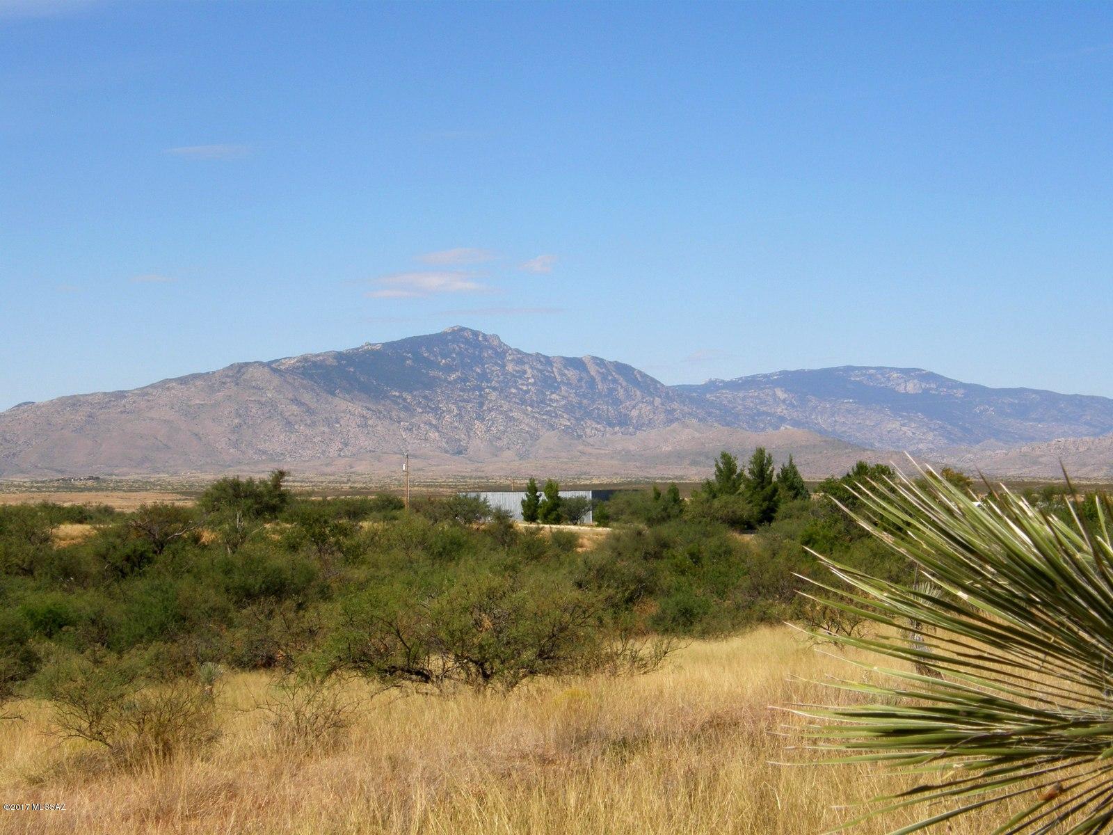 JUST REDUCED $5,500! ONLY $19,500 FOR THIS GREAT HOME SITE. Beauriful home site with spectacular mountain views in all directions. Conveniently close to I-10 offering an easy commute to Tucson and Sierra Vista. Shopping, dining, golf and medical in nearby Benson. Power on Desert Sunset so all you need is your well and septic. Come and enjoy beautiful mountain views, spectacular sunsets and a quiet rural lifestyle. Lots of room for your horses and pets.!