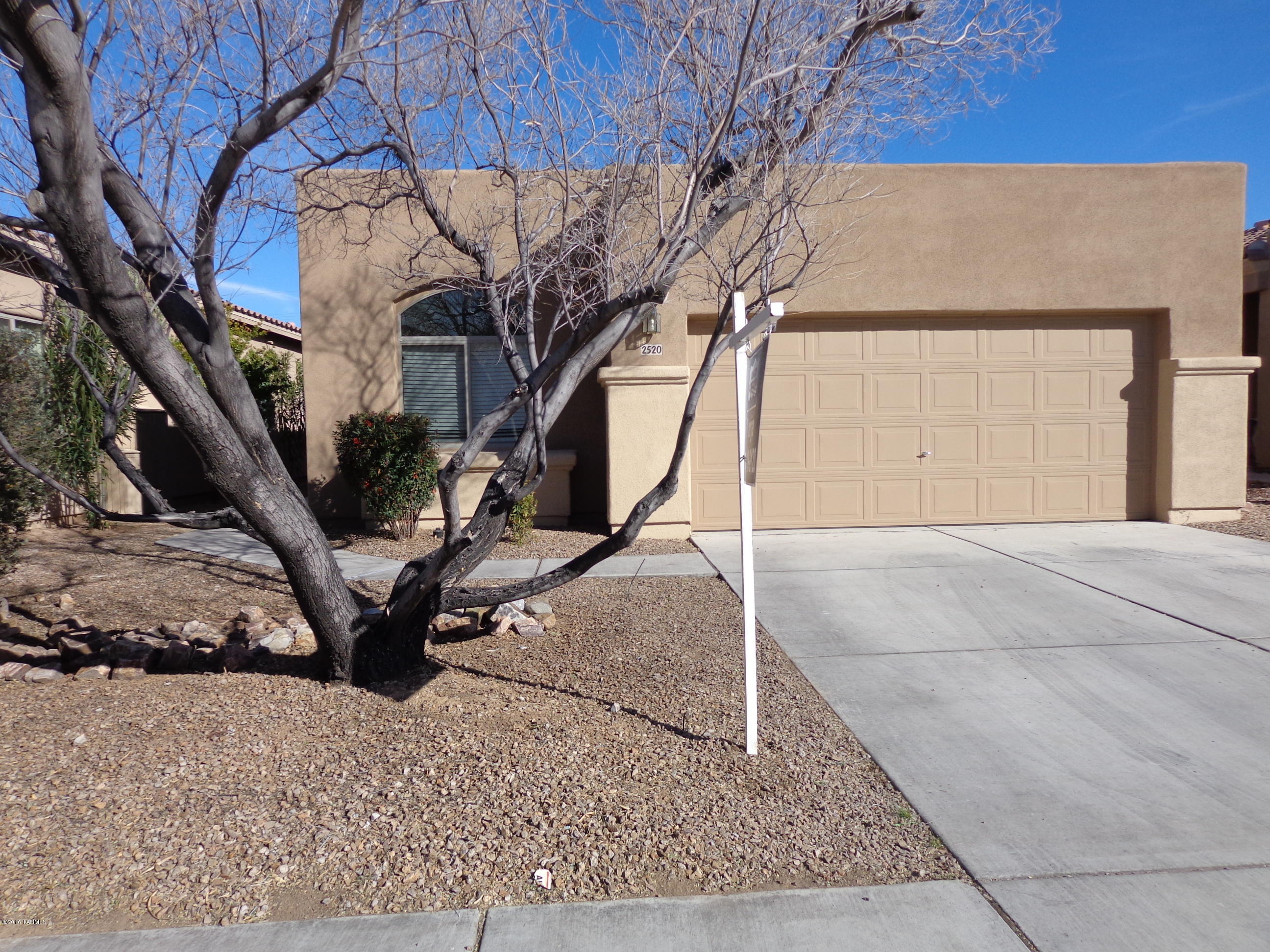 Open floor plan with three split bedrooms, two full baths, fireplace, skylights, built in & display shelves.  No Age Restriction neighborhood has easy access to I-19 and shopping.  Back yard faces east with mountain views and no neighbors behind!  Back yard also has a fenced in swimming pool, recently re-plastered, and covered patio. Open kitchen with eat-in nook, Maple 42'' upper cabinets, gas stove and includes Refrigerator!  Exterior of home freshly painted in 2015. Walk to the neighborhood amenities; park, pool/spa & basketball court.  Low HOA dues.