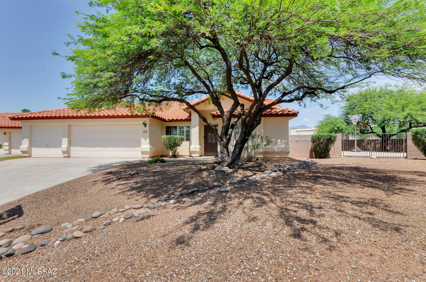 '' Home is where the heart is'' and this property will steal your heart! Picture your family enjoying this huge backyard with a pool, spa and basketball court. Room for more toys and even a pickle ball court. Covered patio to enjoy a BBQ and watch the storms over the Mountains. Desirable Seneca Terrace II offers space between neighbors and the convenience of close amenities including Udall Park. High Ceilings, plantation shutters, new paint and carpet!  Split master bedroom with access to the patio. Bath includes double vanity, separate tub & Shower. 4th bedroom offers double door entry located w/ privacy making it perfect for an in home office. Kitchen open to great room with charming eat in nook. Lots of cabinets, counter space, pantry & newer appliances. Three car garage !